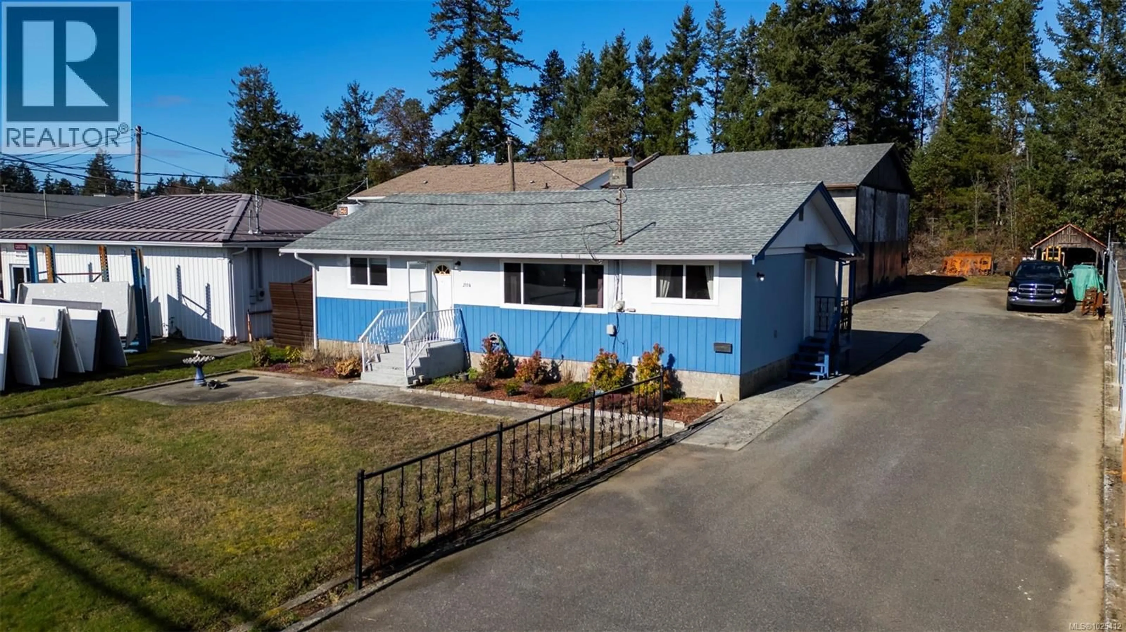 A pic from outside/outdoor area/front of a property/back of a property/a pic from drone, street for 2116 NORTHFIELD ROAD, Nanaimo British Columbia V9S3B9