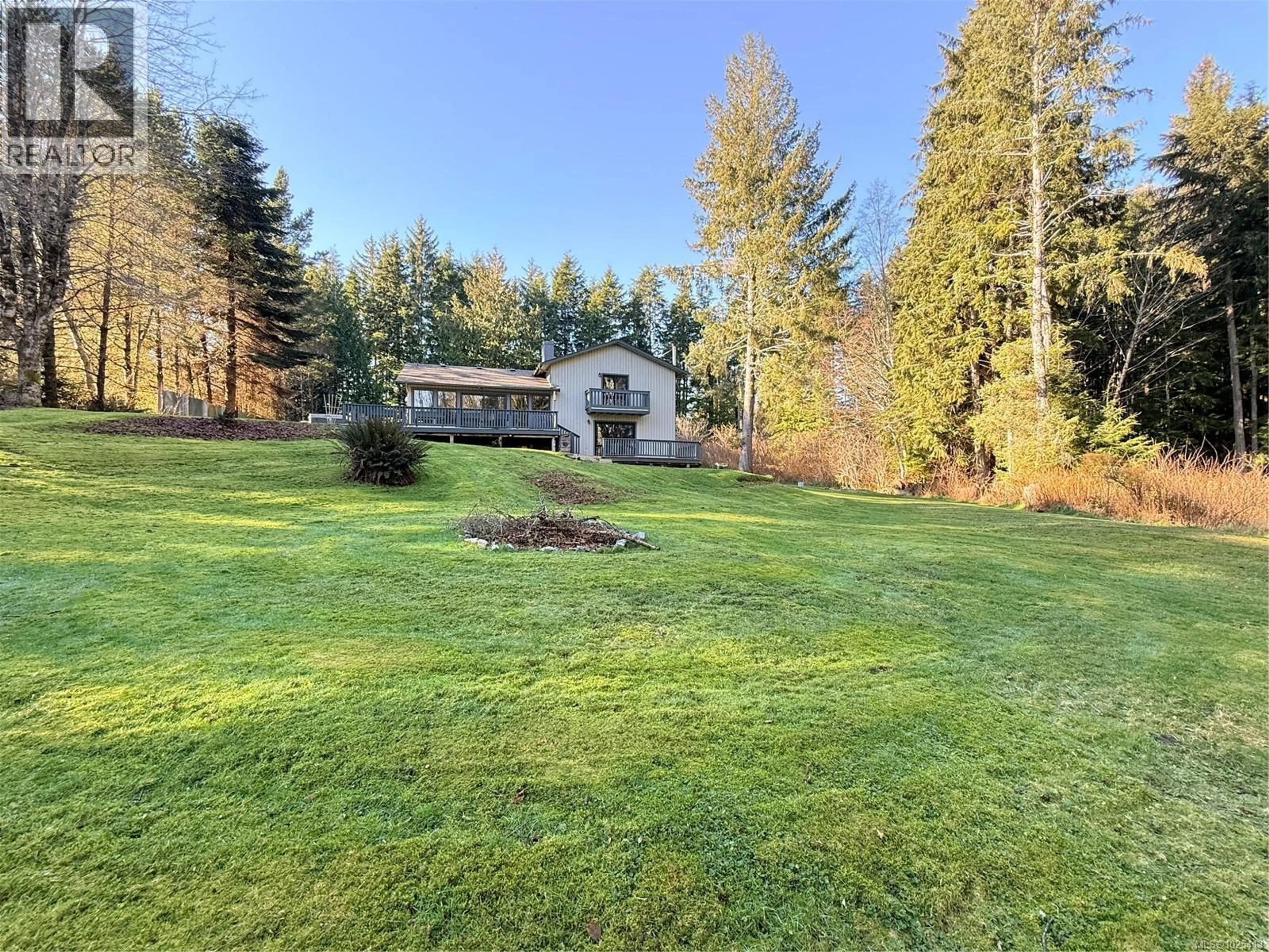 A pic from outside/outdoor area/front of a property/back of a property/a pic from drone, forest/trees view for 980 NICHOLSON ROAD, Hyde Creek British Columbia V0N2R0