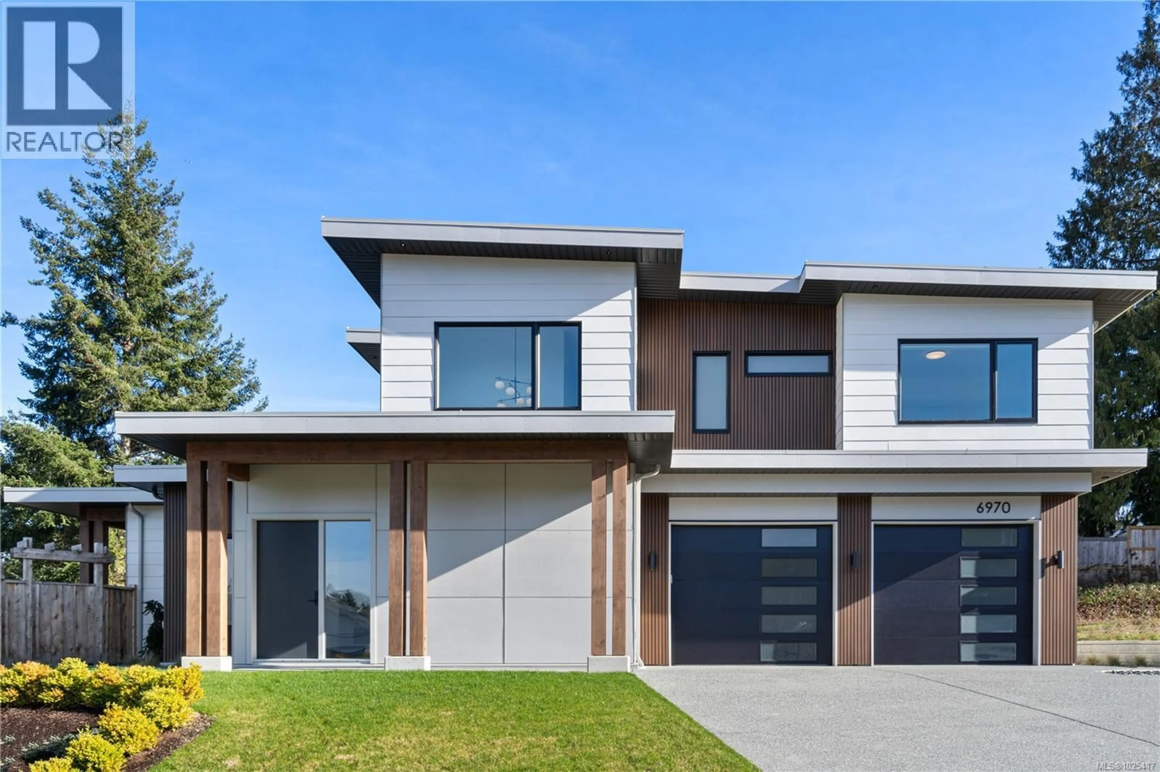 Home with brick exterior material, street for 6970 SHALE ROAD, Lantzville British Columbia V0R2H0