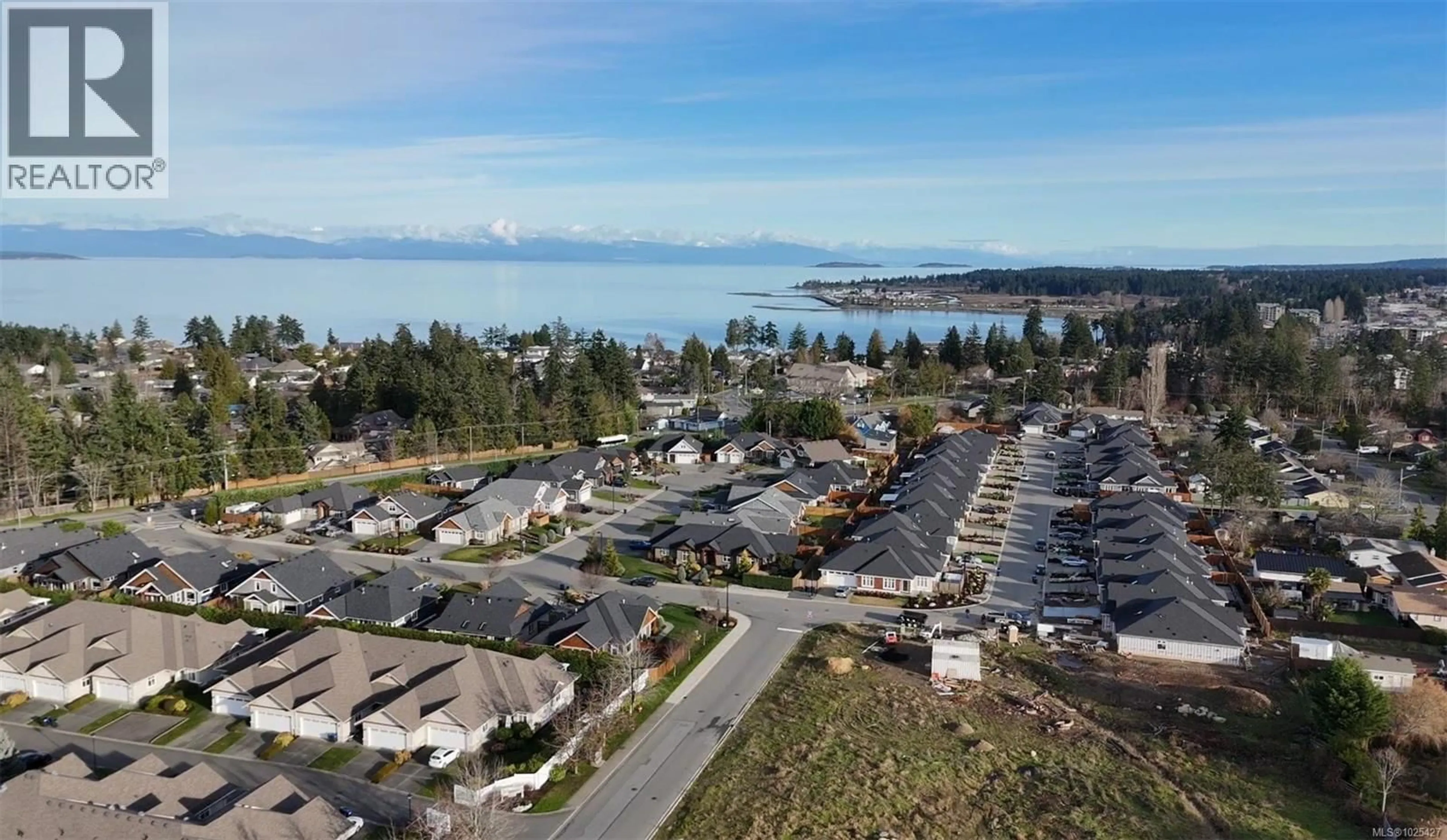A pic from outside/outdoor area/front of a property/back of a property/a pic from drone, water/lake/river/ocean view for 214 CAMERON STREET, Parksville British Columbia V9P1G7