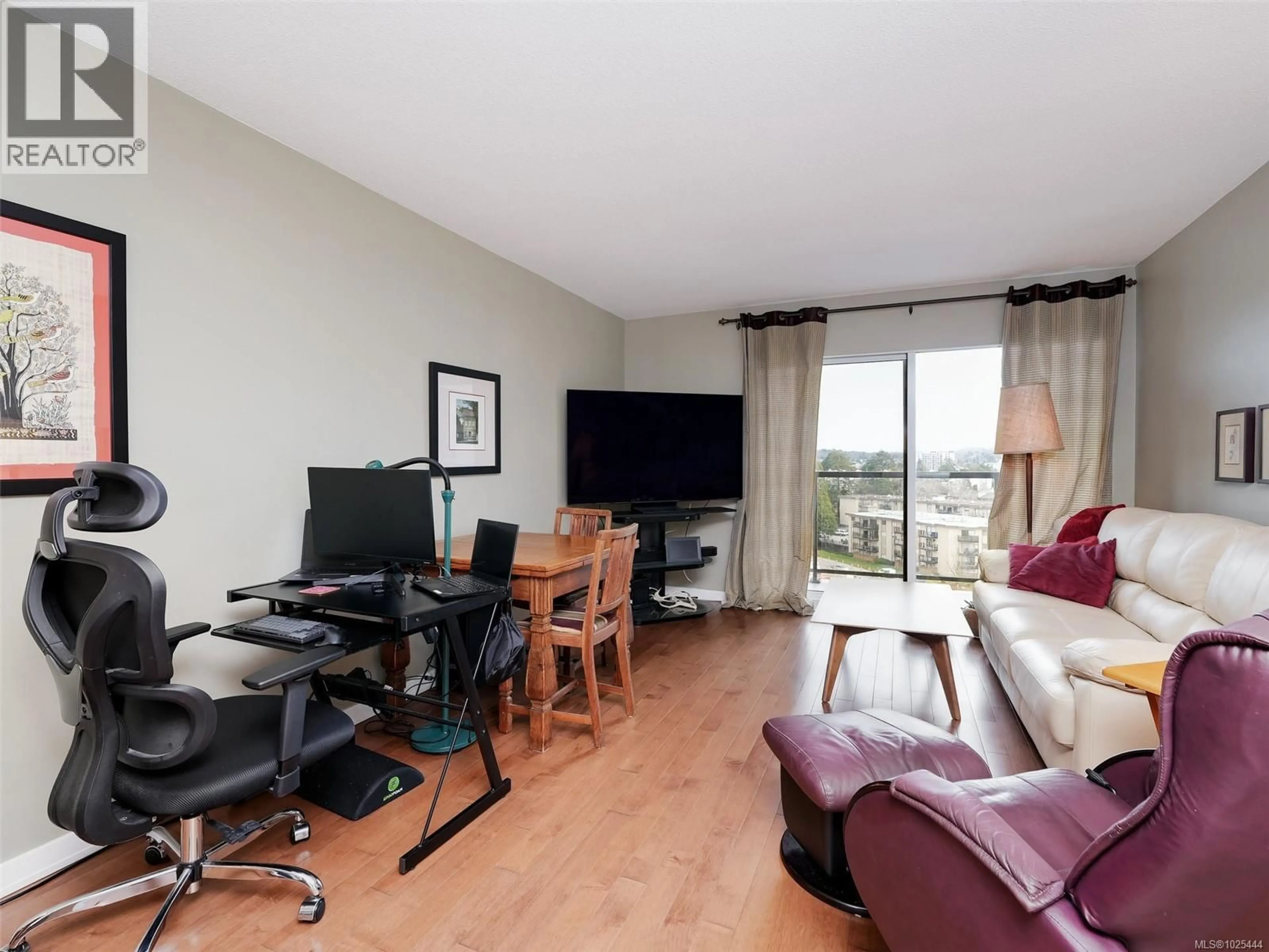 Living room with furniture, wood/laminate floor for 709 - 103 GORGE ROAD EAST, Victoria British Columbia V9A6Z2