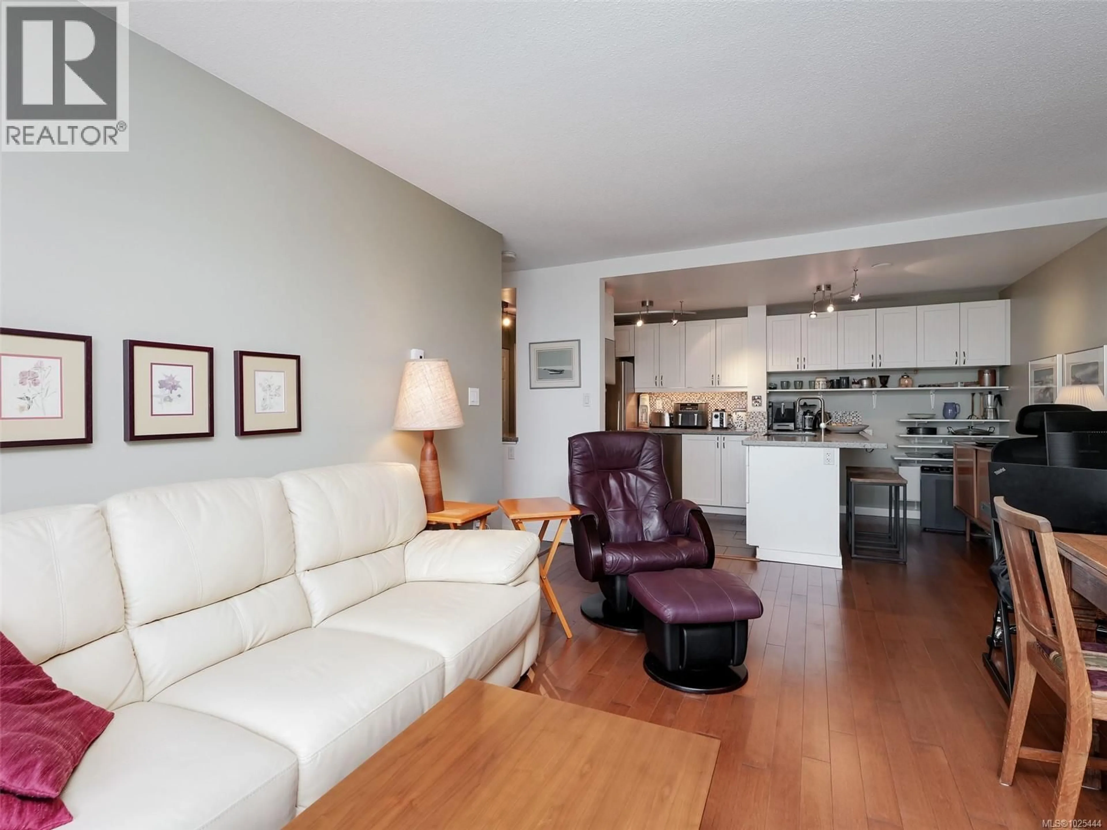 Living room with furniture, wood/laminate floor for 709 - 103 GORGE ROAD EAST, Victoria British Columbia V9A6Z2