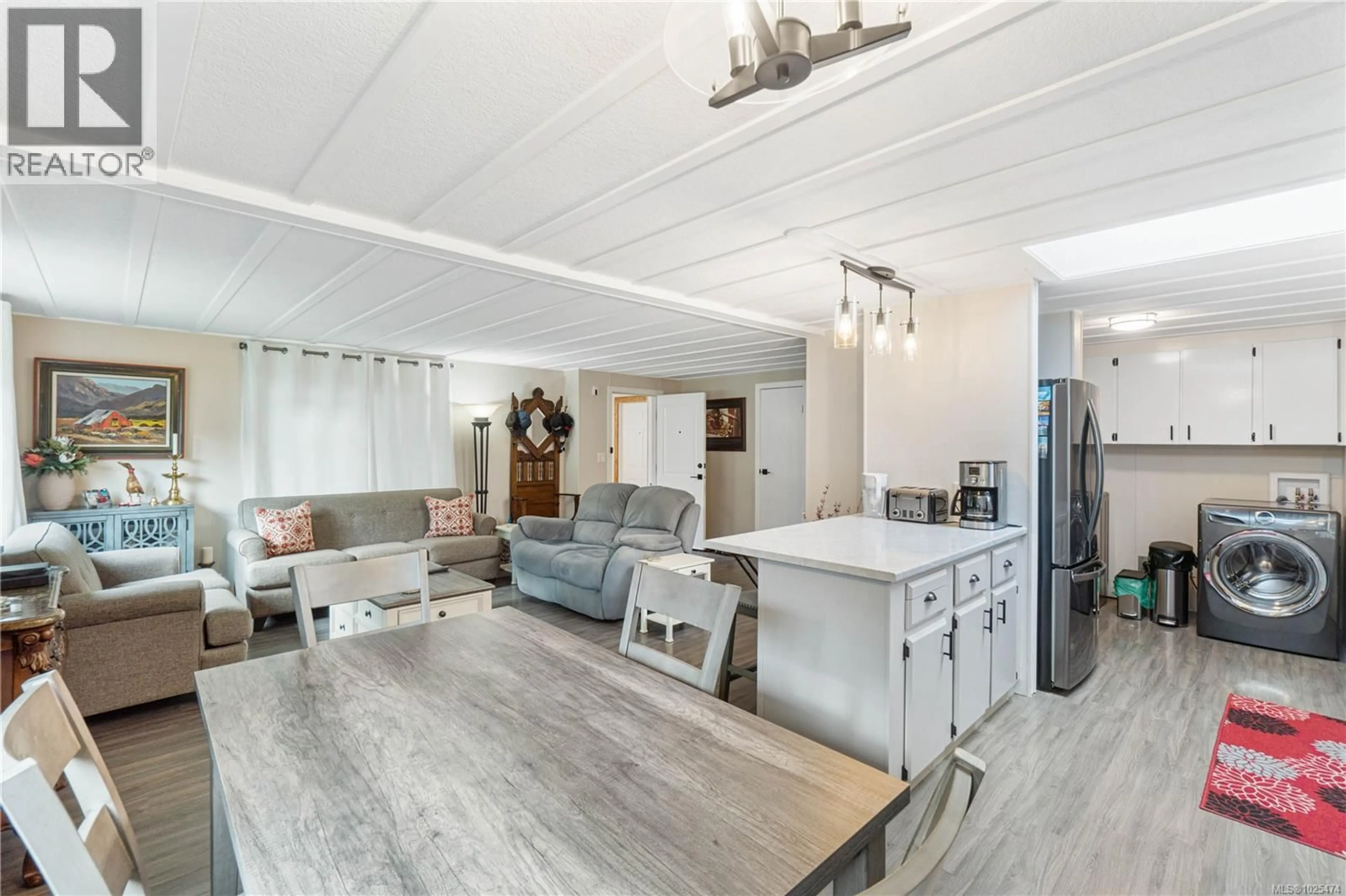 Open concept kitchen, wood/laminate floor for 259 - 2465 APOLLO DRIVE, Nanoose Bay British Columbia V9P9K2