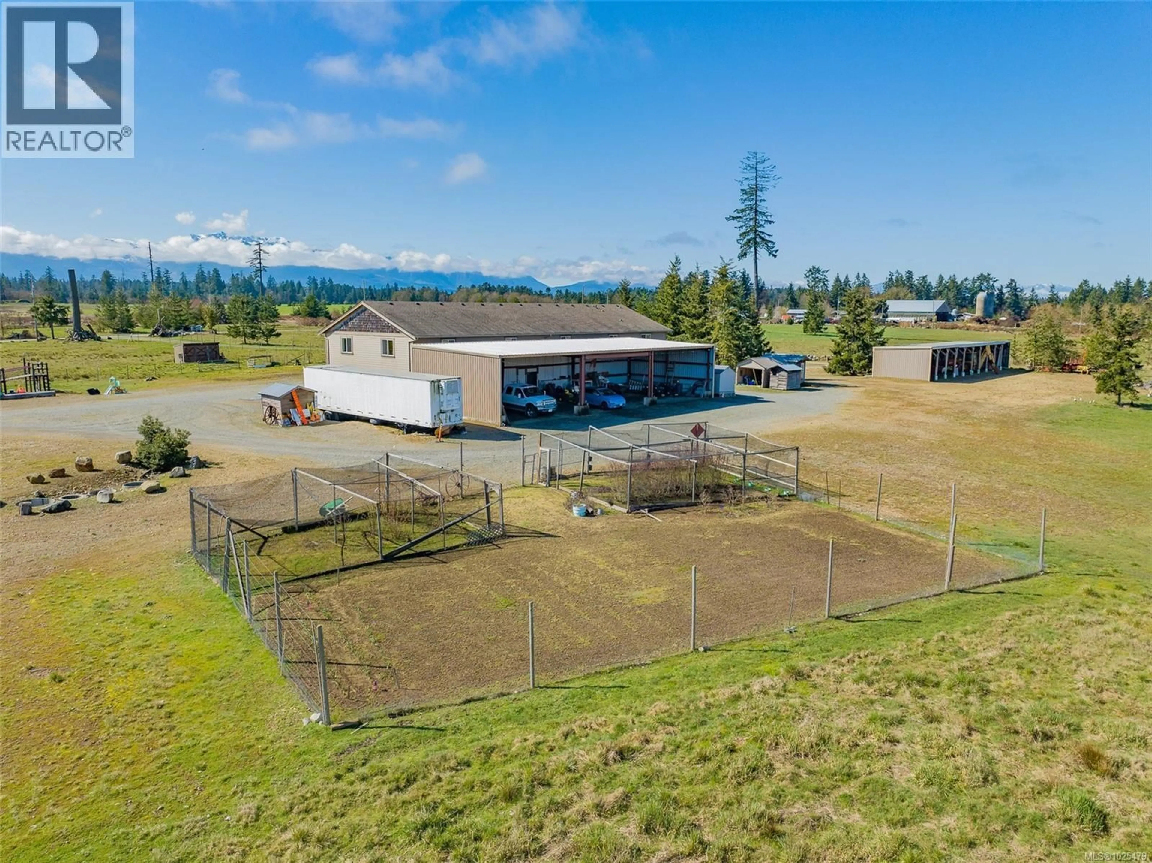 A pic from outside/outdoor area/front of a property/back of a property/a pic from drone, mountain view for 1355 HODGES ROAD, French Creek British Columbia V9P2B5