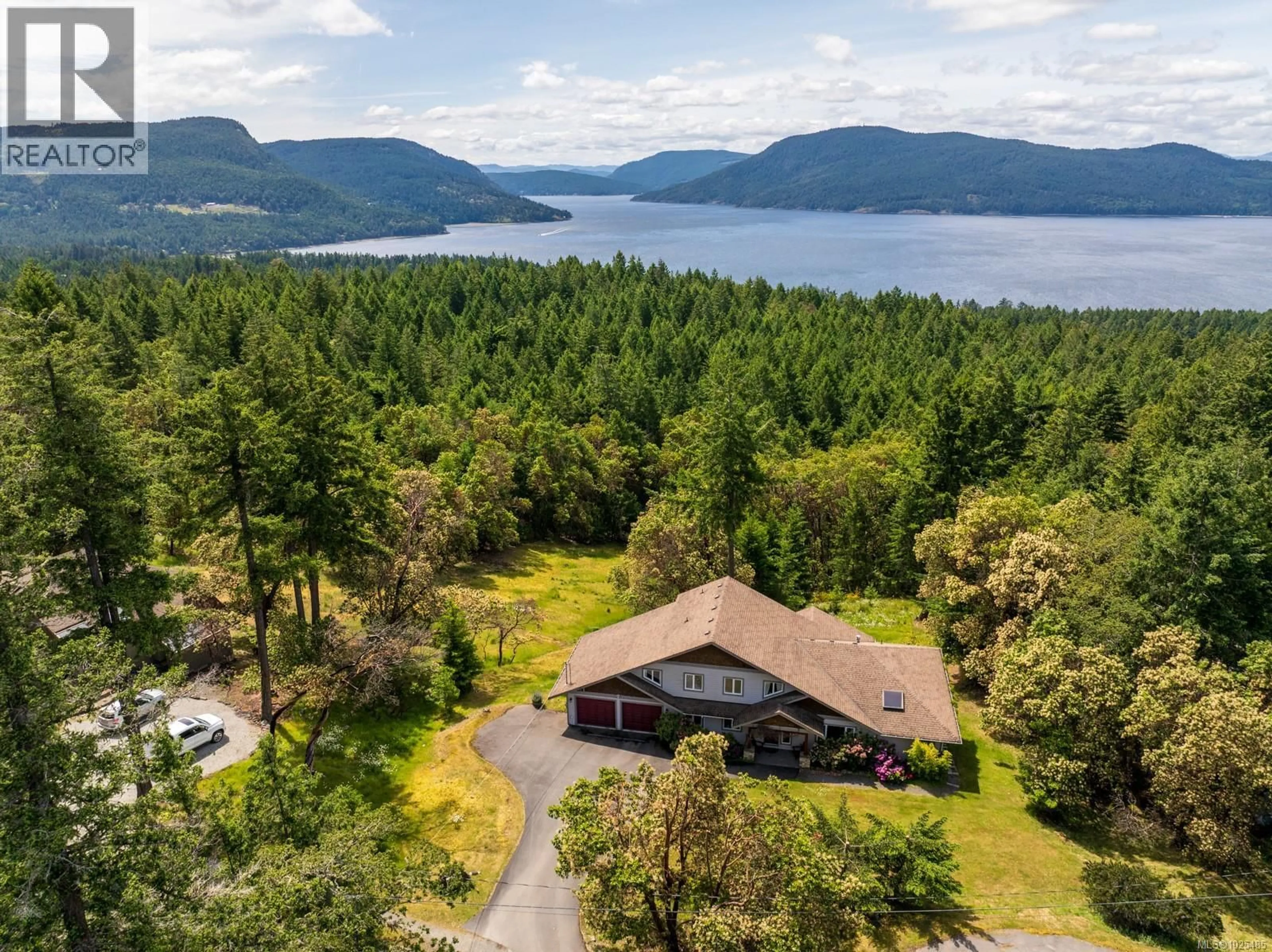 A pic from outside/outdoor area/front of a property/back of a property/a pic from drone, water/lake/river/ocean view for 103 MURRELET PLACE, Salt Spring British Columbia V8K1G9