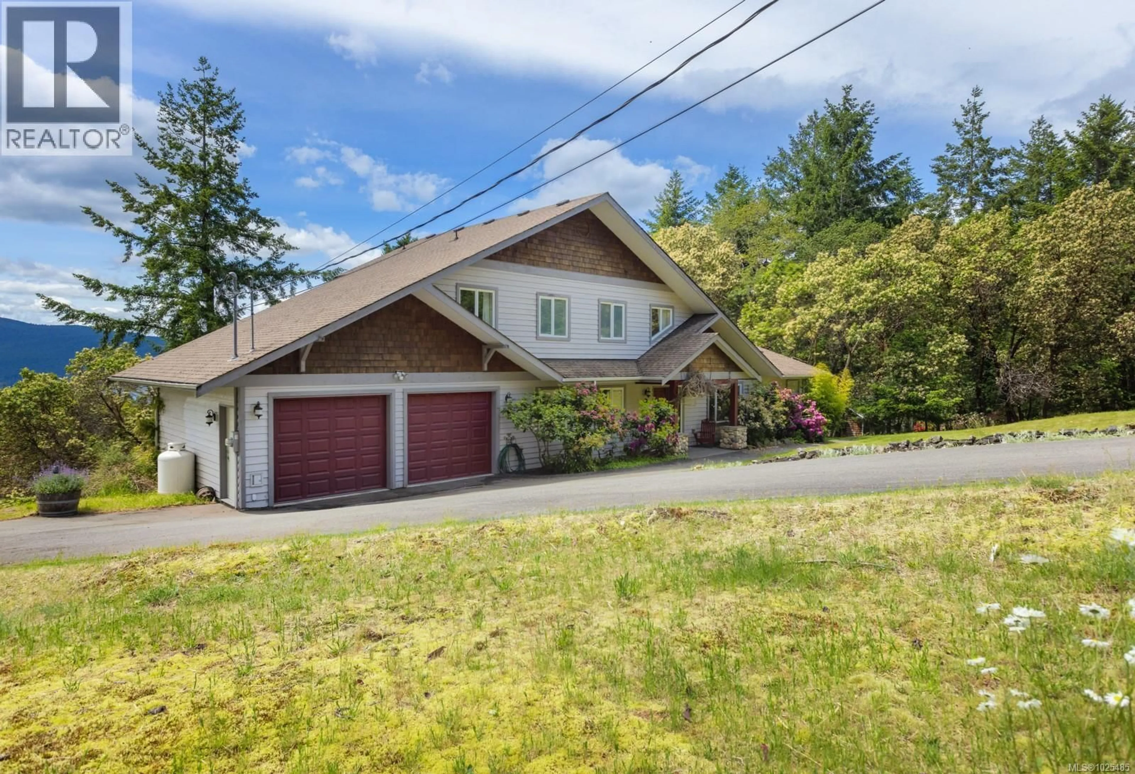 A pic from outside/outdoor area/front of a property/back of a property/a pic from drone, street for 103 MURRELET PLACE, Salt Spring British Columbia V8K1G9
