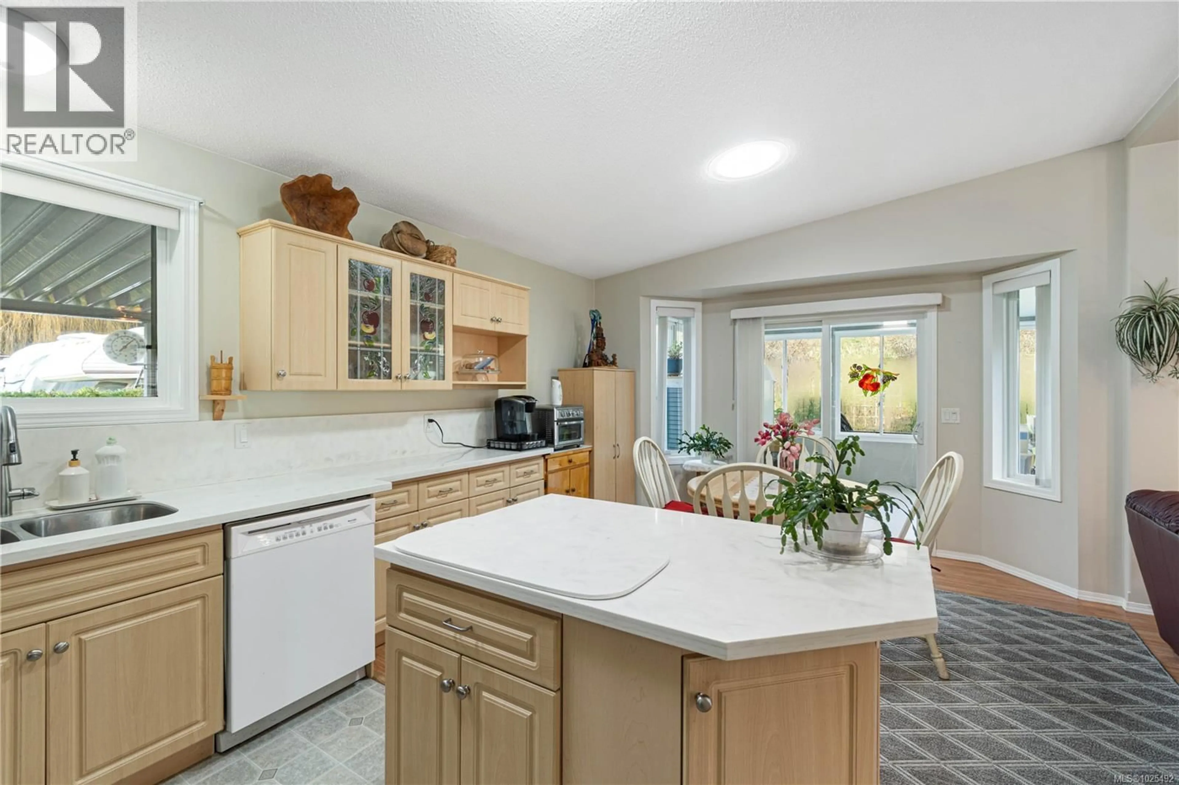 Open concept kitchen, ceramic/tile floor for 6250 FARBER WAY, Nanaimo British Columbia V9T6J2
