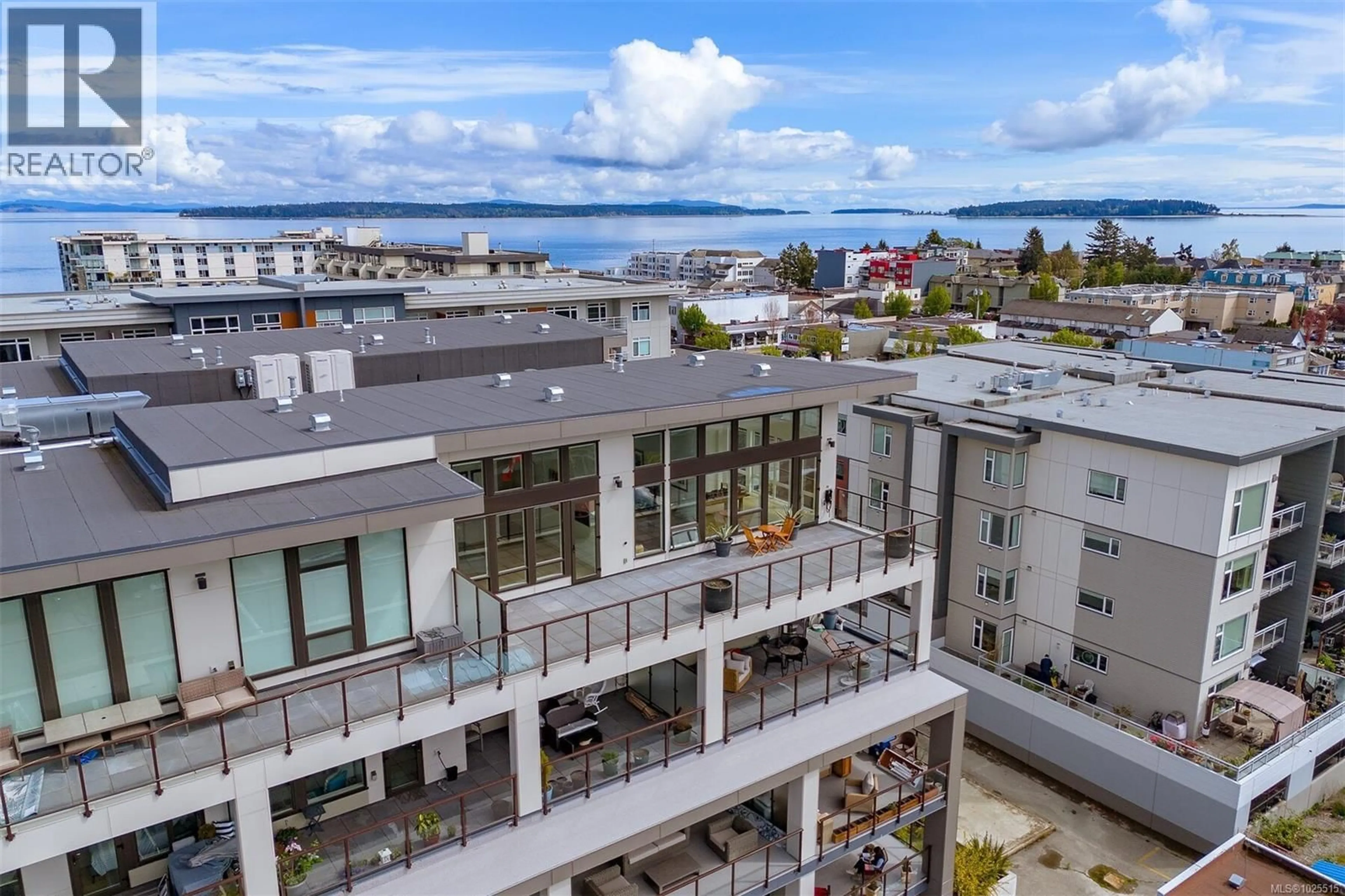 A pic from outside/outdoor area/front of a property/back of a property/a pic from drone, city buildings view from balcony for 603 - 2461 SIDNEY AVENUE, Sidney British Columbia V8L1Y8