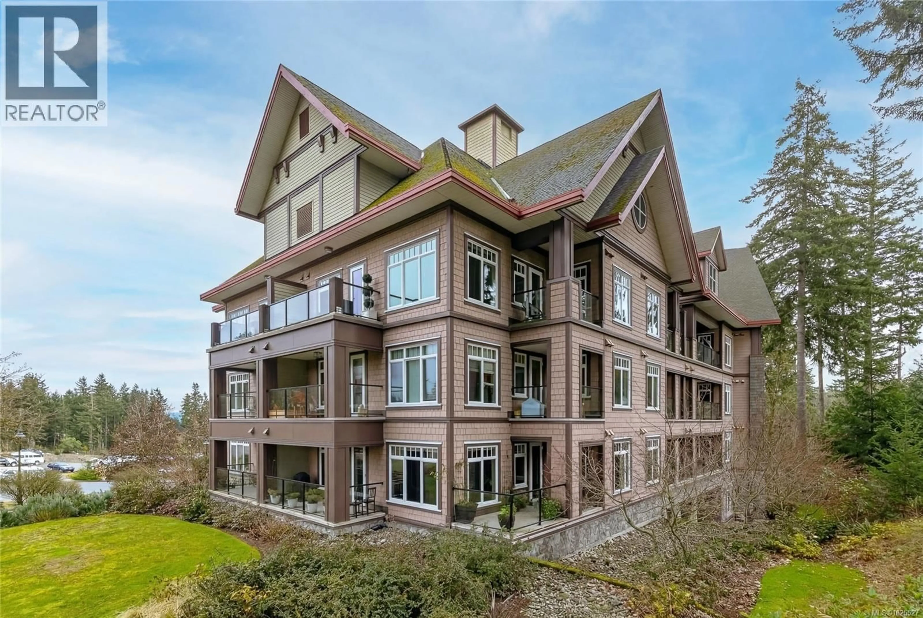 A pic from outside/outdoor area/front of a property/back of a property/a pic from drone, building for 407 - 1395 BEAR MOUNTAIN PARKWAY, Langford British Columbia V9B0E1