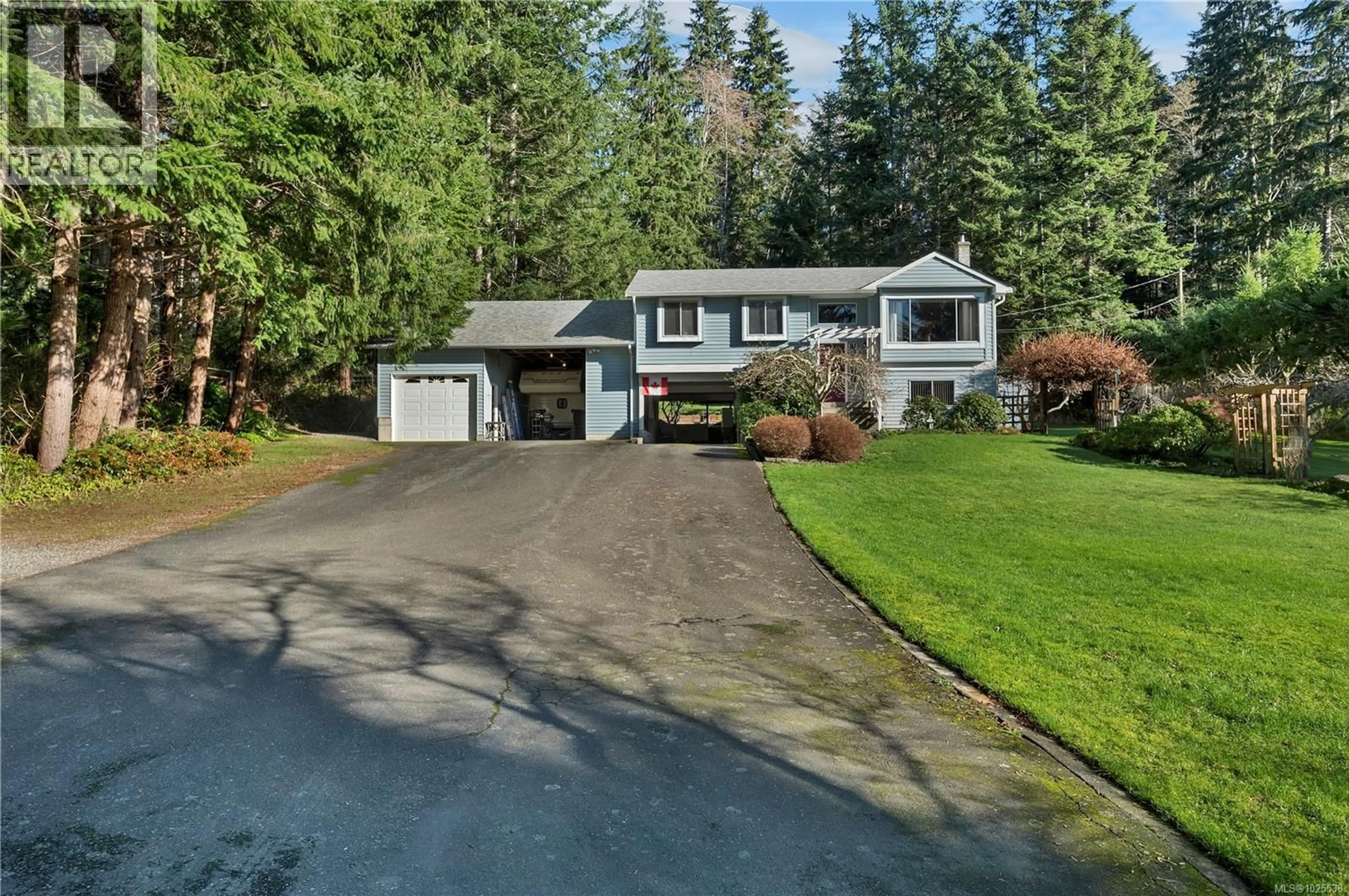 A pic from outside/outdoor area/front of a property/back of a property/a pic from drone, street for 698 PLAZA ROAD, Quadra Island British Columbia V0P1N0
