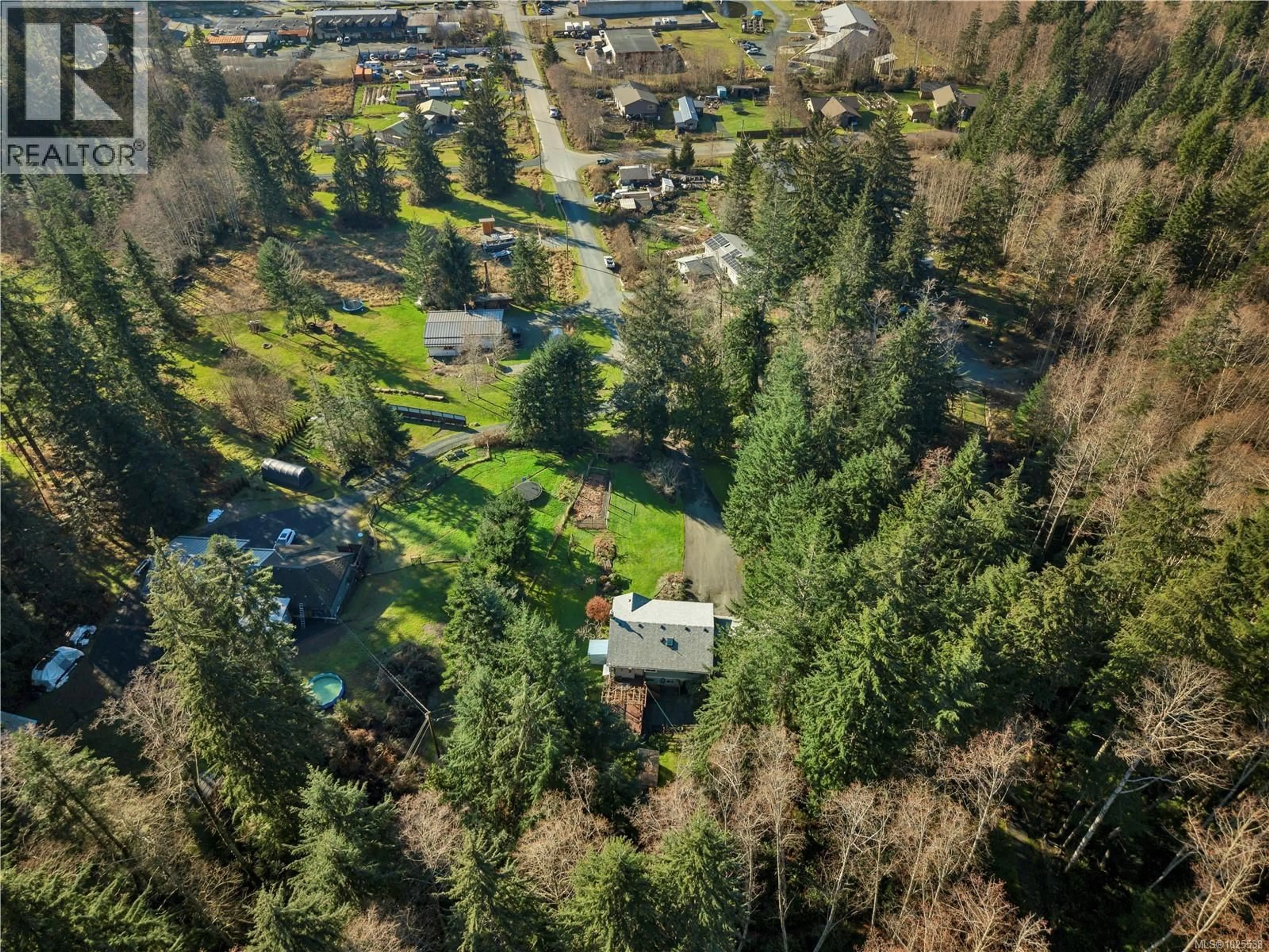 A pic from outside/outdoor area/front of a property/back of a property/a pic from drone, forest/trees view for 698 PLAZA ROAD, Quadra Island British Columbia V0P1N0