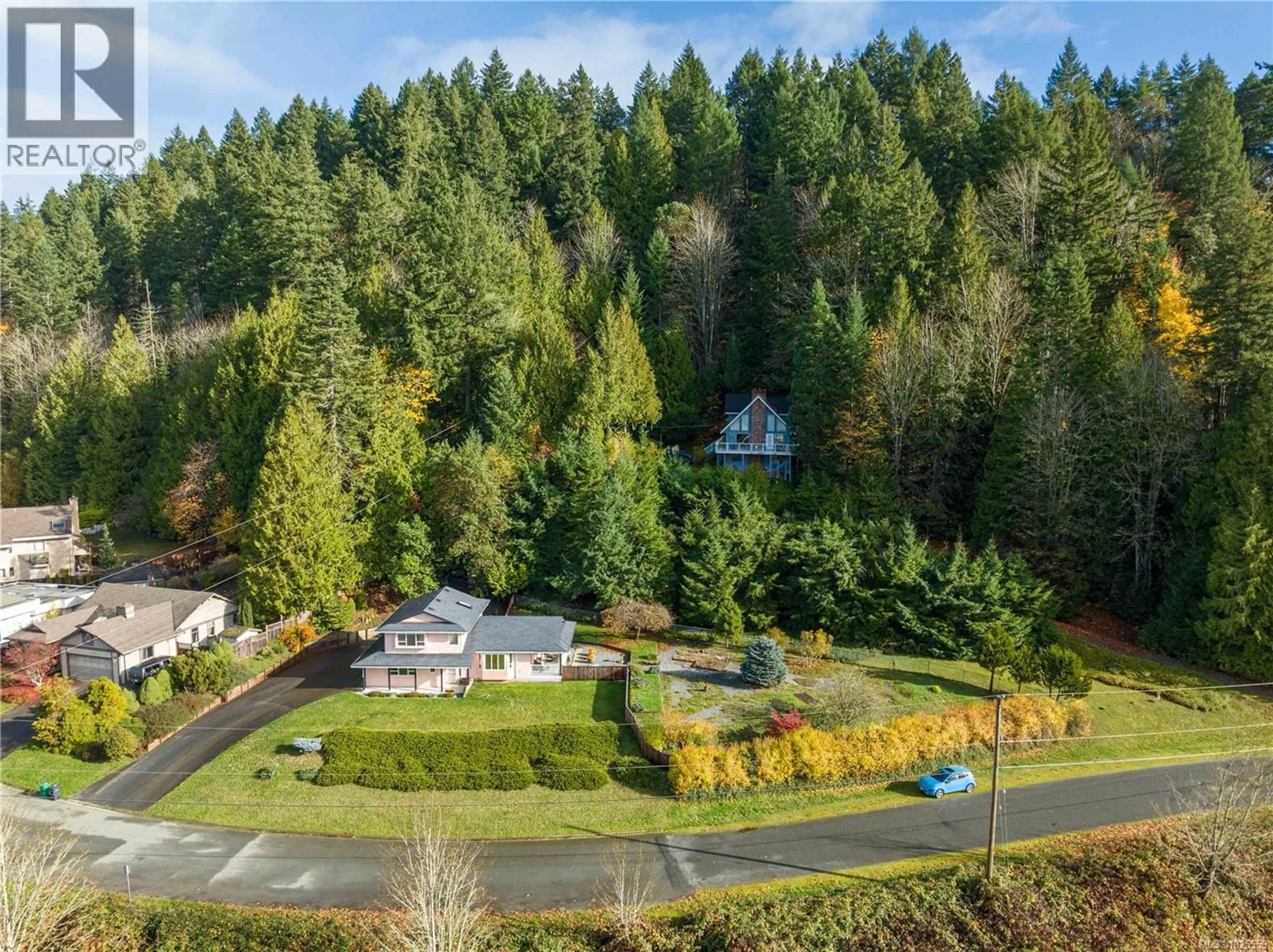 A pic from outside/outdoor area/front of a property/back of a property/a pic from drone, forest/trees view for 1900 KELSIE ROAD, Nanaimo British Columbia V9X1B7