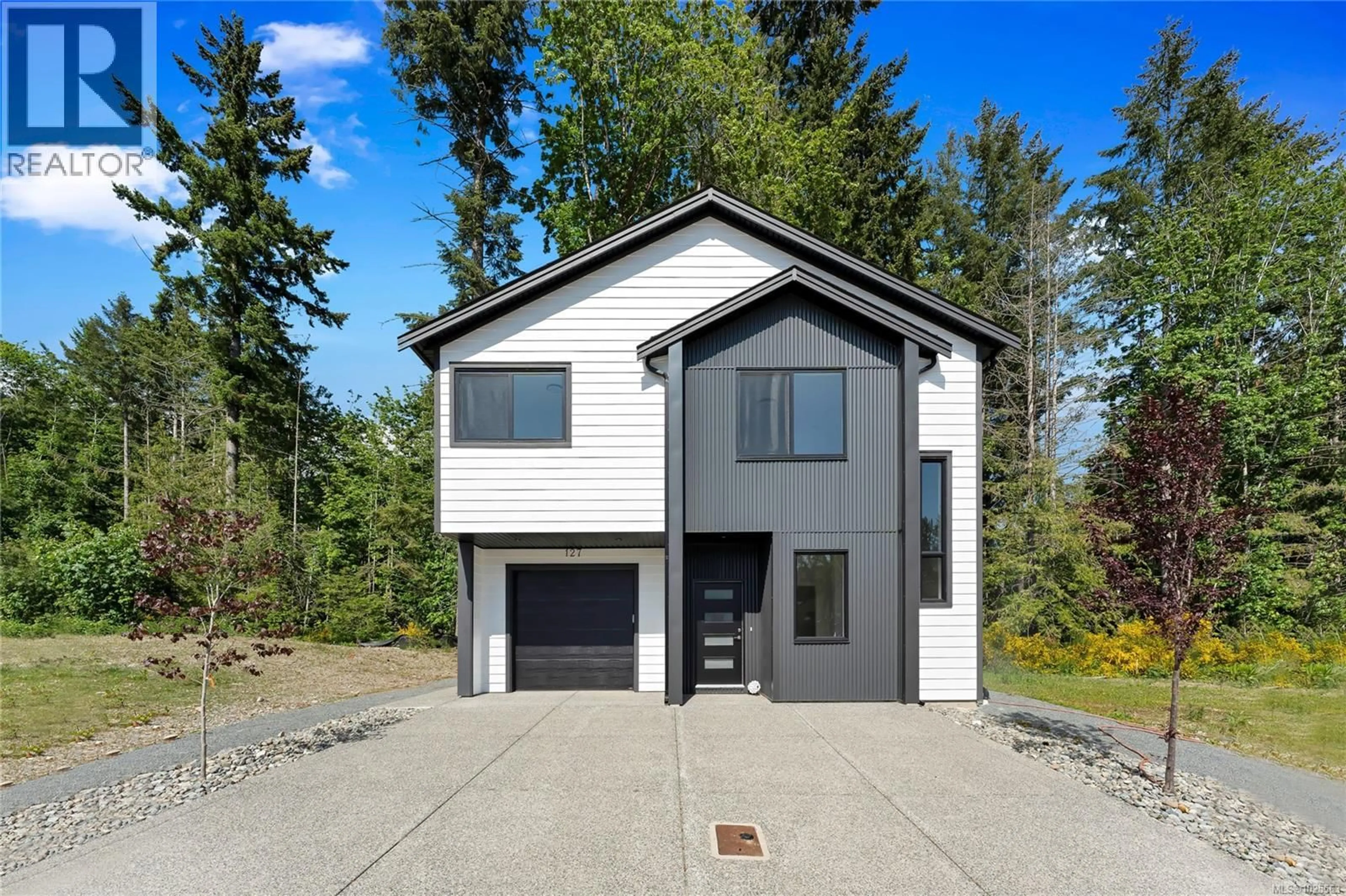 Home with vinyl exterior material, street for 127 HERITAGE CREEK DRIVE, Lake Cowichan British Columbia V0R2G0