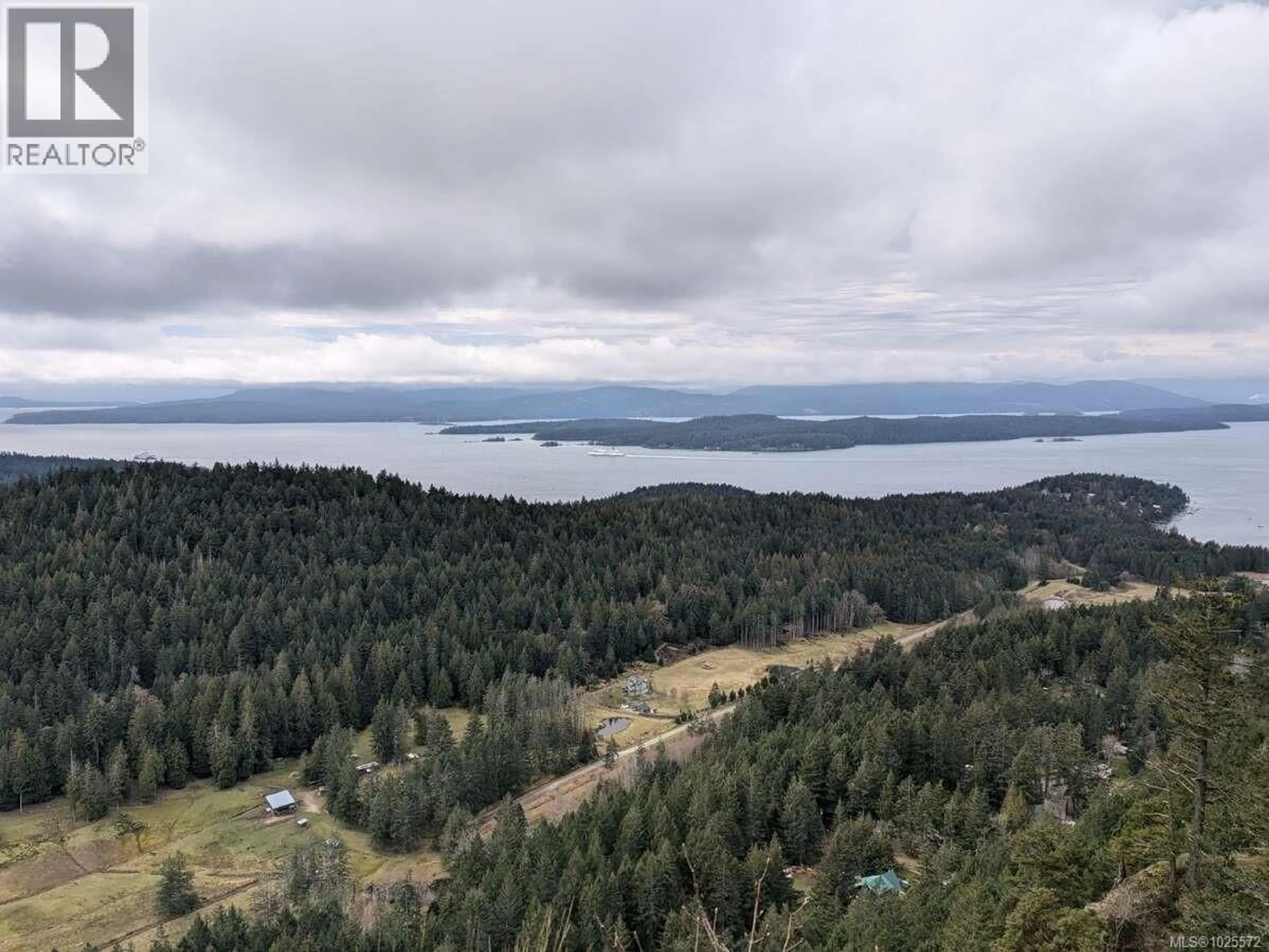 A pic from outside/outdoor area/front of a property/back of a property/a pic from drone, water/lake/river/ocean view for 300 WOOD DALE DRIVE, Mayne Island British Columbia V0N2J2