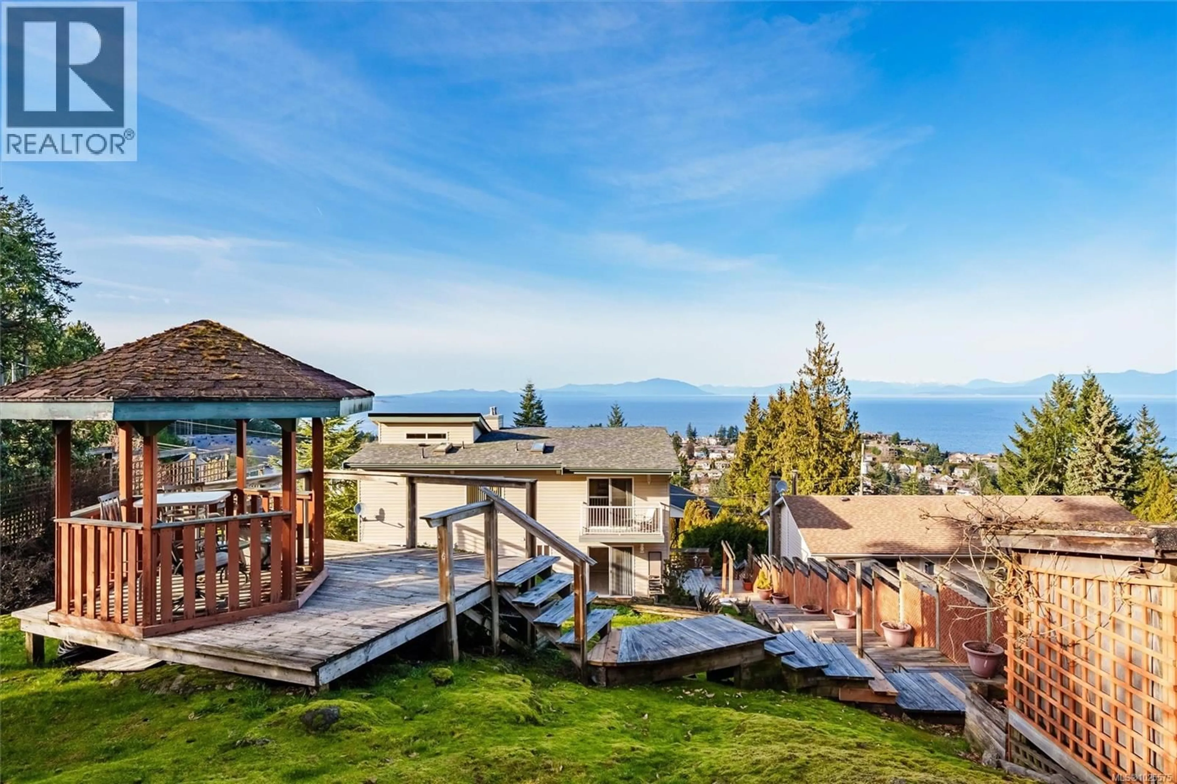 A pic from outside/outdoor area/front of a property/back of a property/a pic from drone, water/lake/river/ocean view for 4627 LOST LAKE ROAD, Nanaimo British Columbia V9T5C5