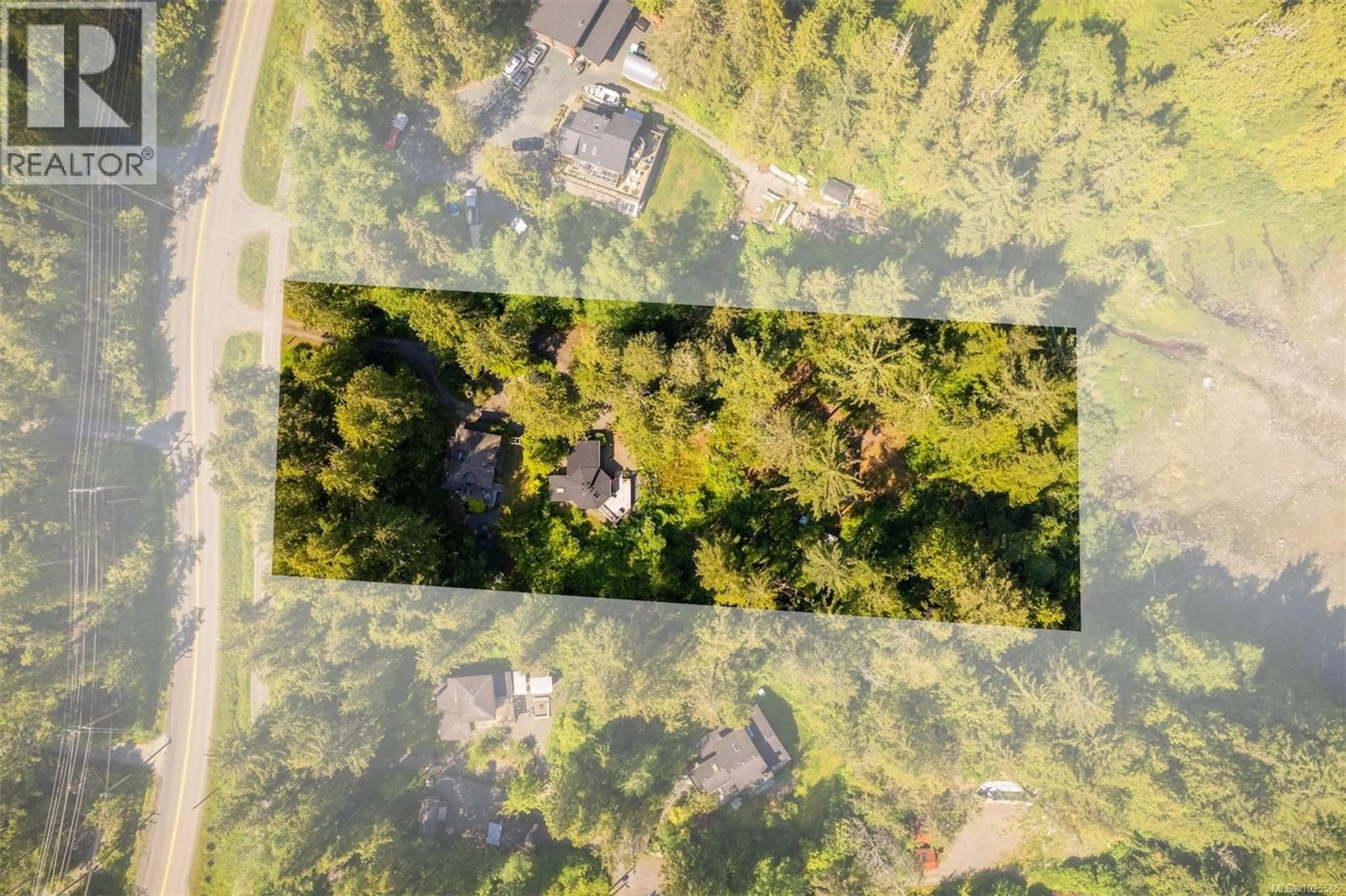 A pic from outside/outdoor area/front of a property/back of a property/a pic from drone, forest/trees view for 1076 PACIFIC RIM HIGHWAY, Tofino British Columbia V0R2Z0