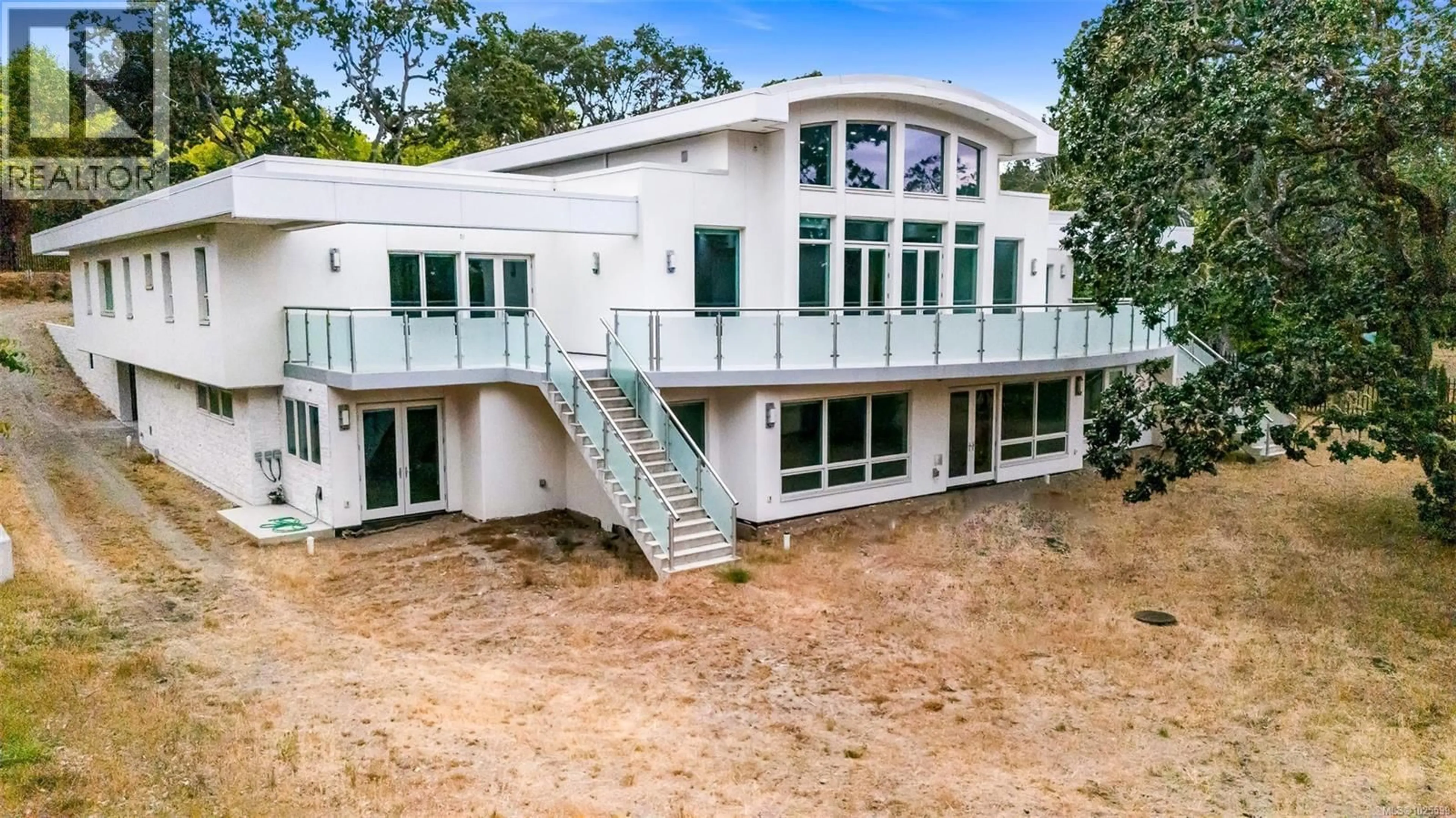 A pic from outside/outdoor area/front of a property/back of a property/a pic from drone, building for 3355 MIDLAND ROAD, Oak Bay British Columbia V8R6G7