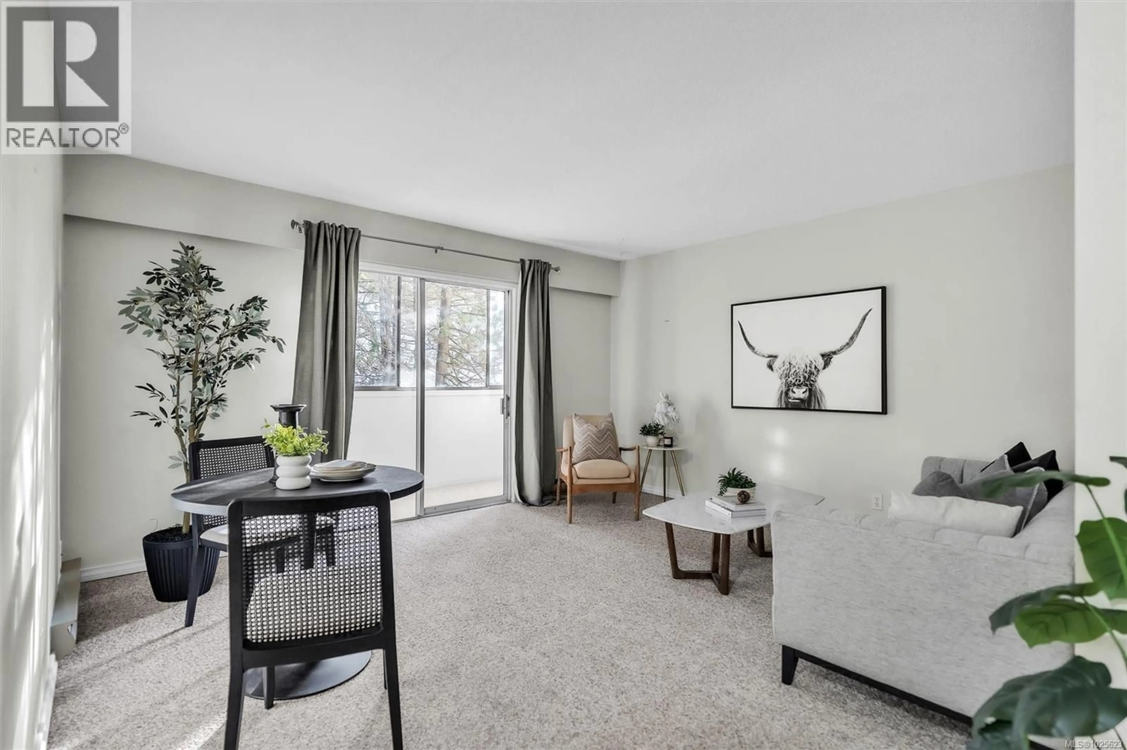 Living room with furniture, unknown for 204 - 1597 MIDGARD AVENUE, Saanich British Columbia V8P2Y2