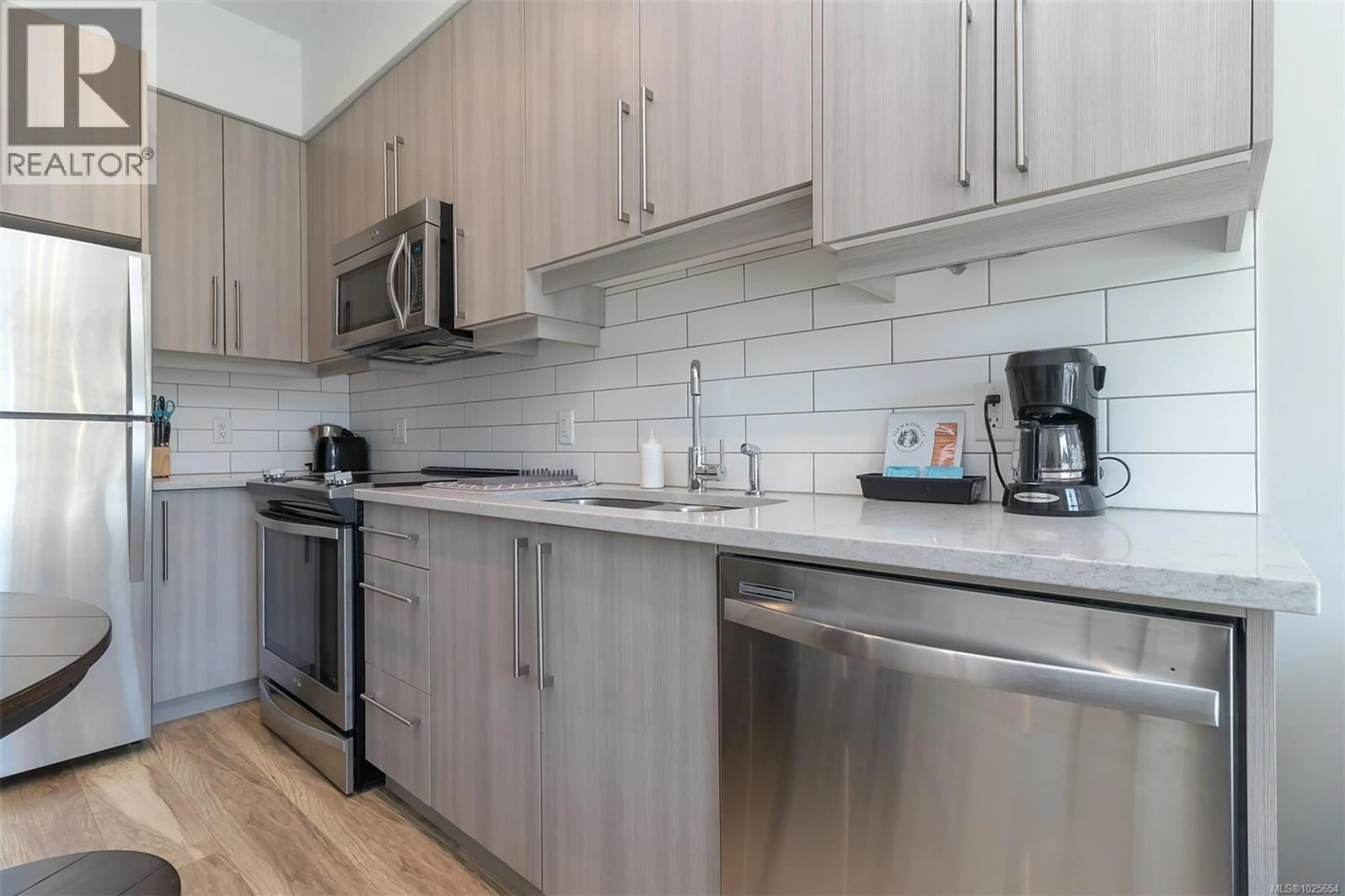 Standard kitchen, wood/laminate floor for 210 - 595 PANDORA AVENUE, Victoria British Columbia V8W1N5