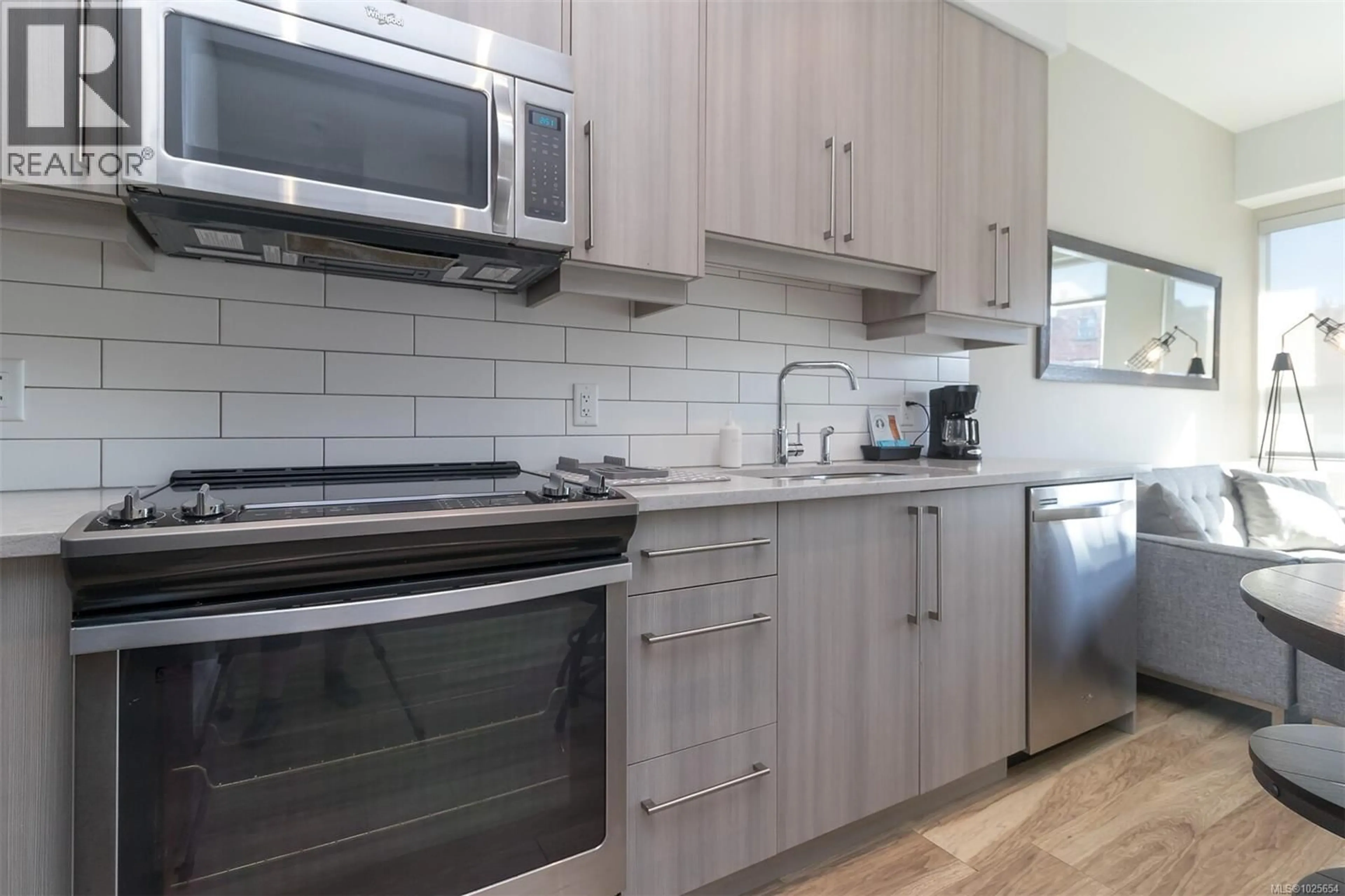 Standard kitchen, wood/laminate floor for 210 - 595 PANDORA AVENUE, Victoria British Columbia V8W1N5