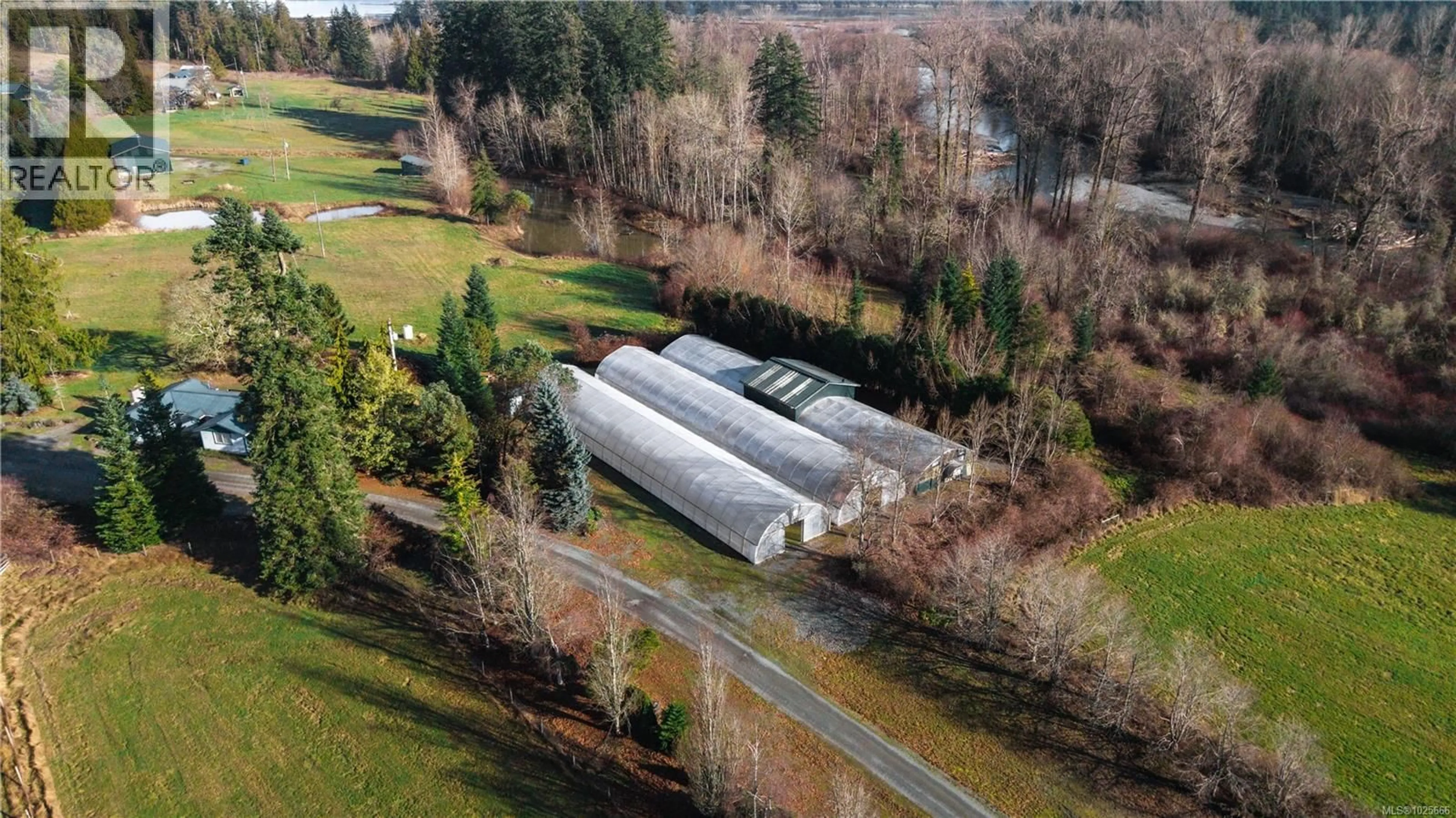 A pic from outside/outdoor area/front of a property/back of a property/a pic from drone, unknown for 8797 CHEMAINUS ROAD, Chemainus British Columbia