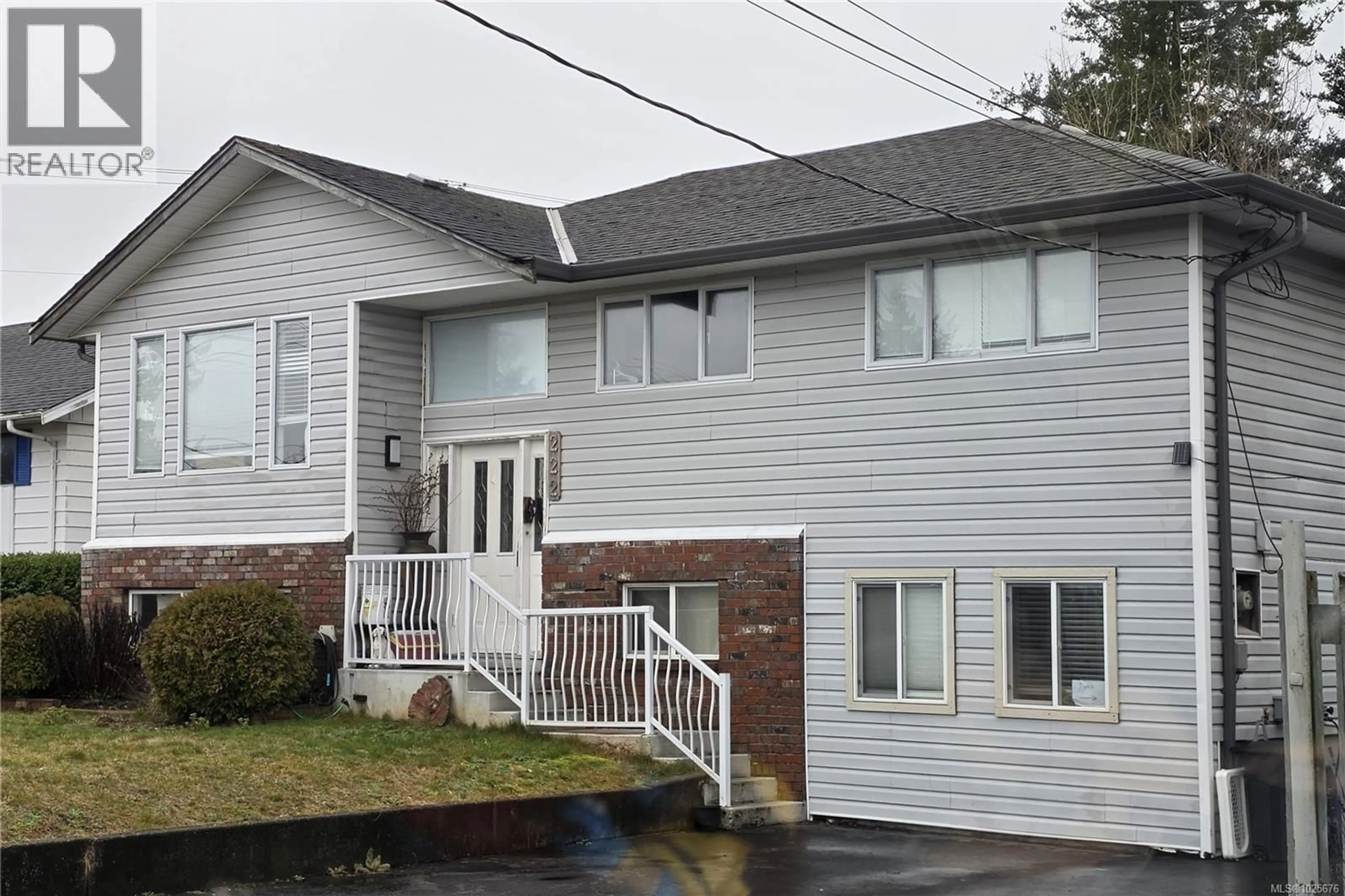 Home with vinyl exterior material, street for 222 THULIN STREET, Campbell River British Columbia V9W2K7