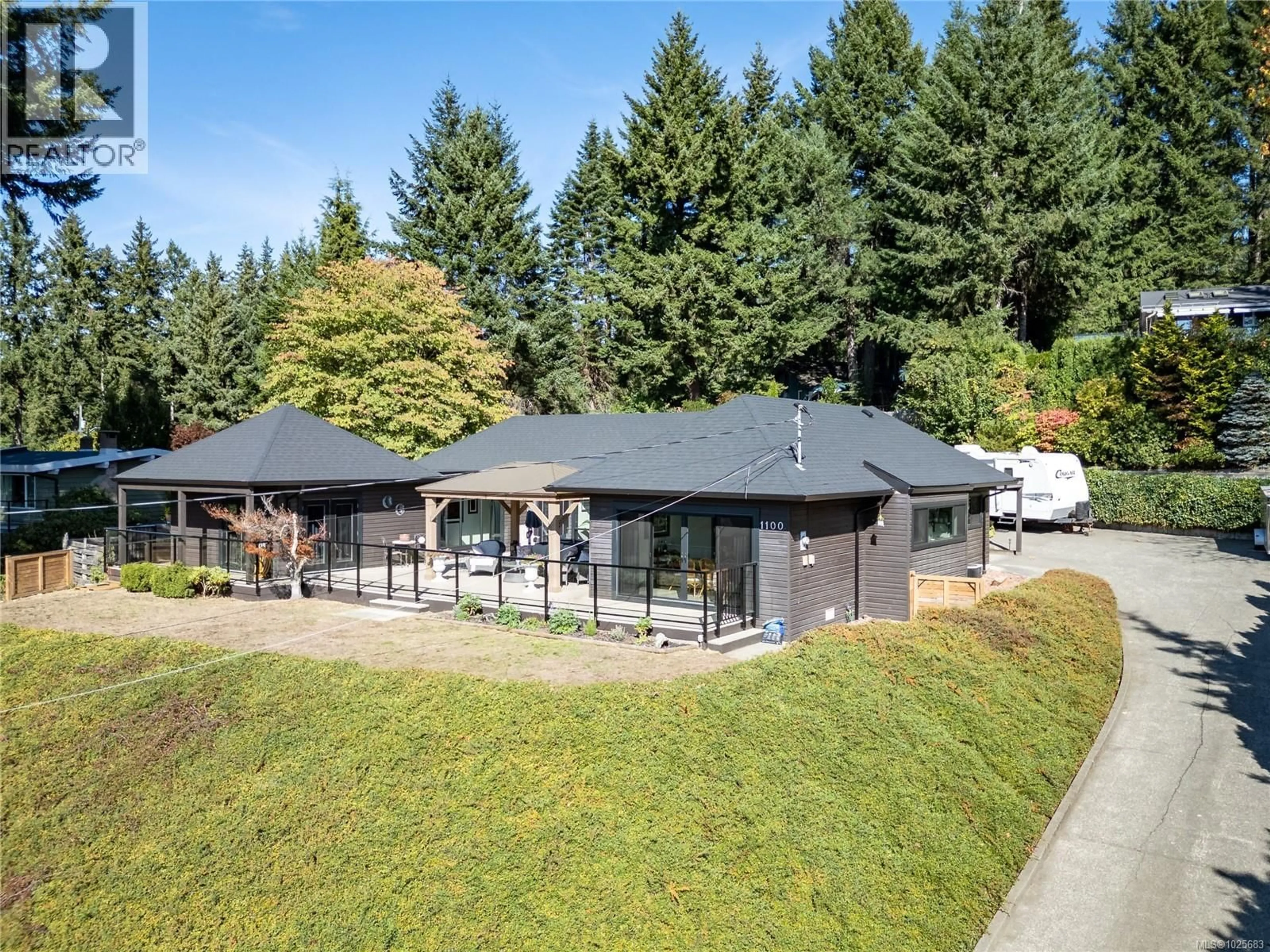 A pic from outside/outdoor area/front of a property/back of a property/a pic from drone, street for 1100 BACK ROAD, Courtenay British Columbia V9N8M7