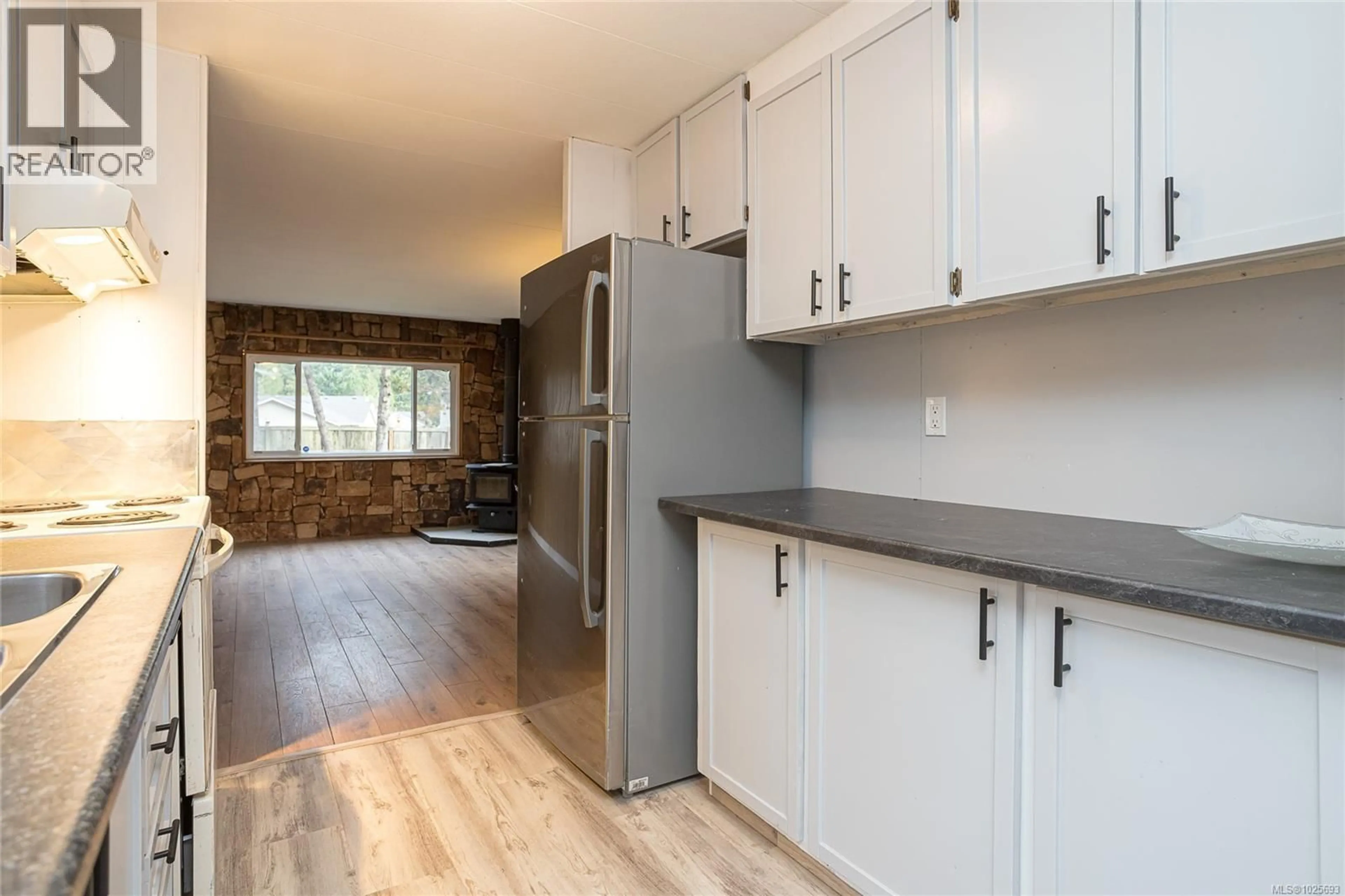 Standard kitchen, wood/laminate floor for 2 - 161 HORNE LAKE ROAD, Qualicum Beach British Columbia V9K1T9