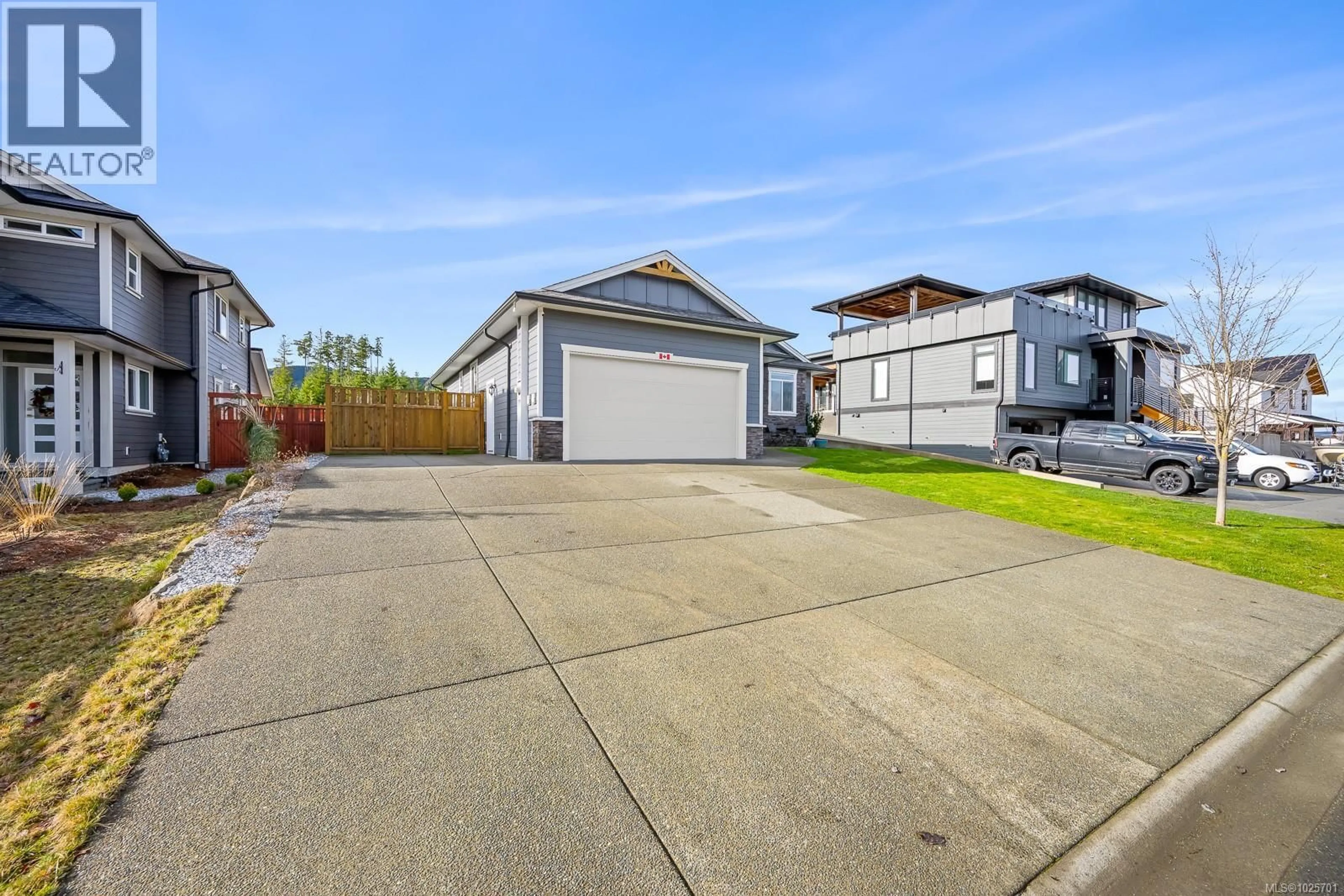 A pic from outside/outdoor area/front of a property/back of a property/a pic from drone, street for 2479 KENTMERE AVENUE, Cumberland British Columbia V0R1S0