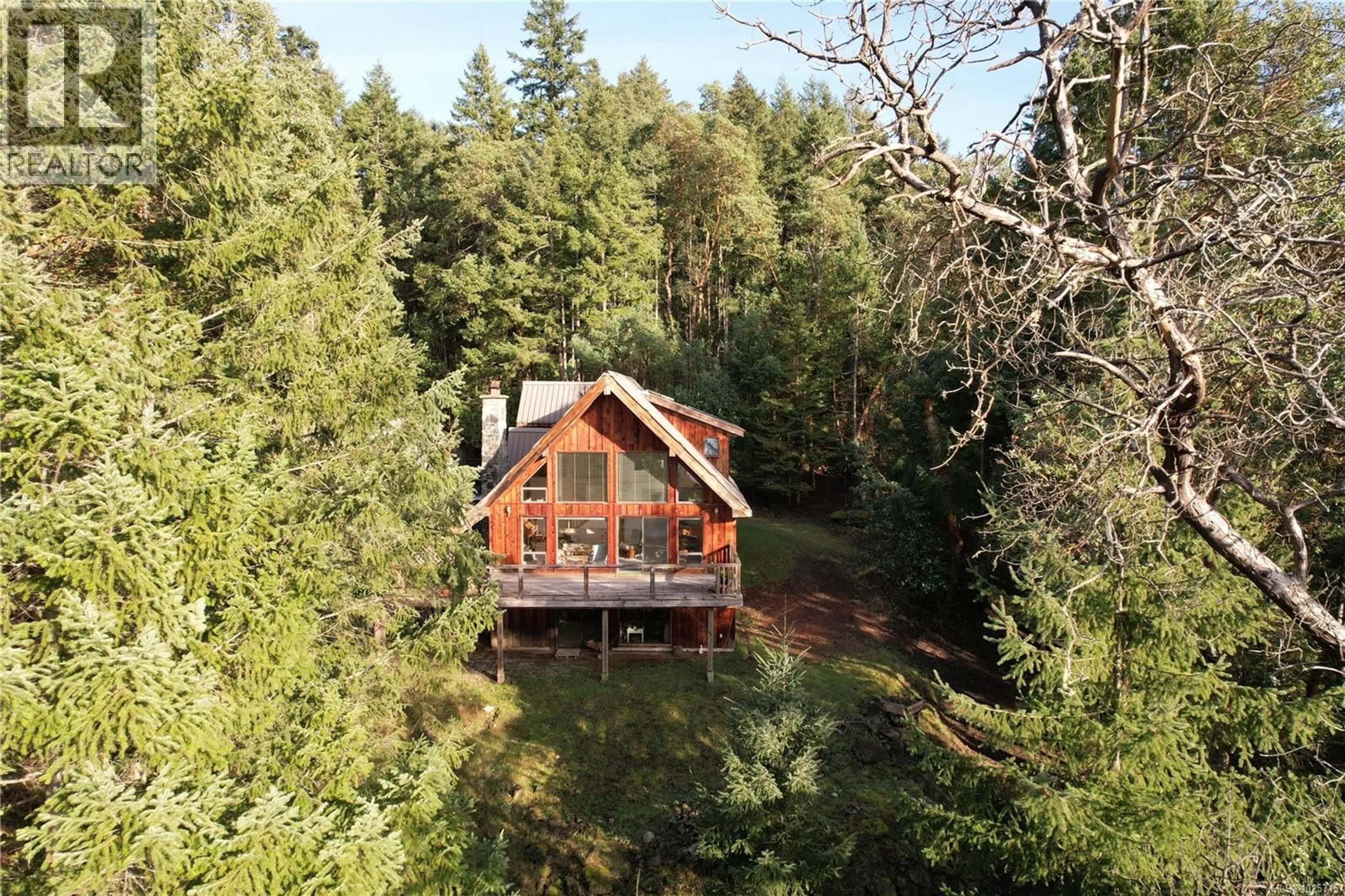 A pic from outside/outdoor area/front of a property/back of a property/a pic from drone, forest/trees view for 160 WEST EAGLE DRIVE, Salt Spring British Columbia V8K1E4