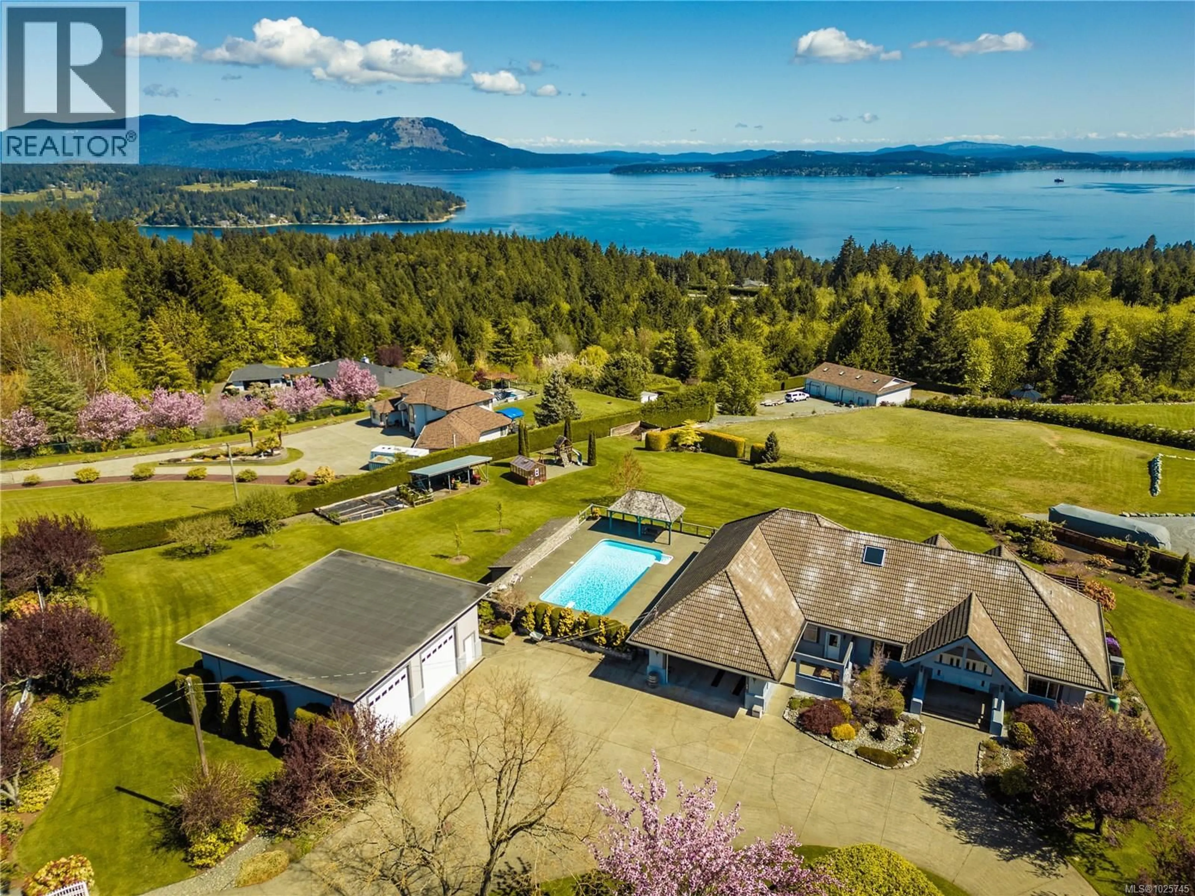 A pic from outside/outdoor area/front of a property/back of a property/a pic from drone, water/lake/river/ocean view for 2321 BOULDING ROAD, Mill Bay British Columbia V0R2P0