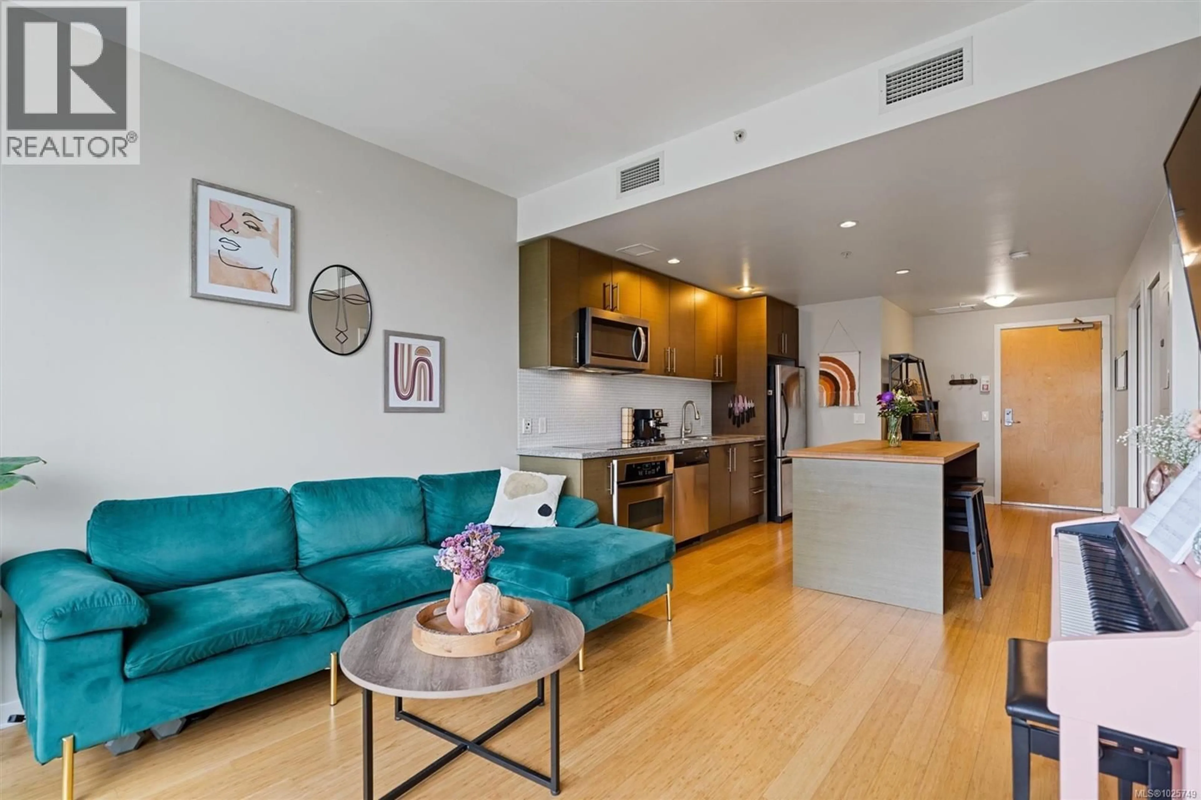 Living room with furniture, unknown for 405 - 391 TYEE ROAD, Victoria British Columbia V9A0A9