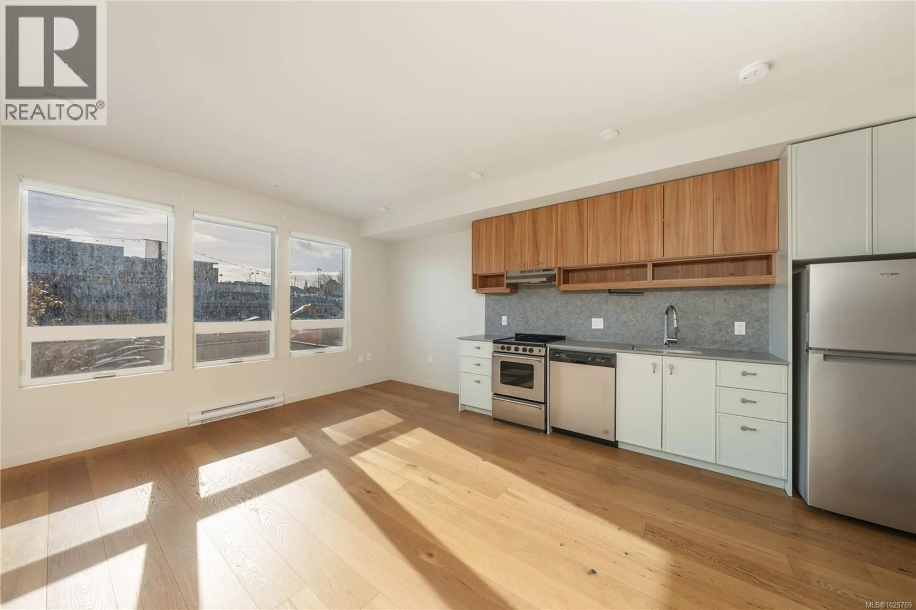 Open concept kitchen, wood/laminate floor for 210 - 629 SPEED AVENUE, Victoria British Columbia V8Z1A5