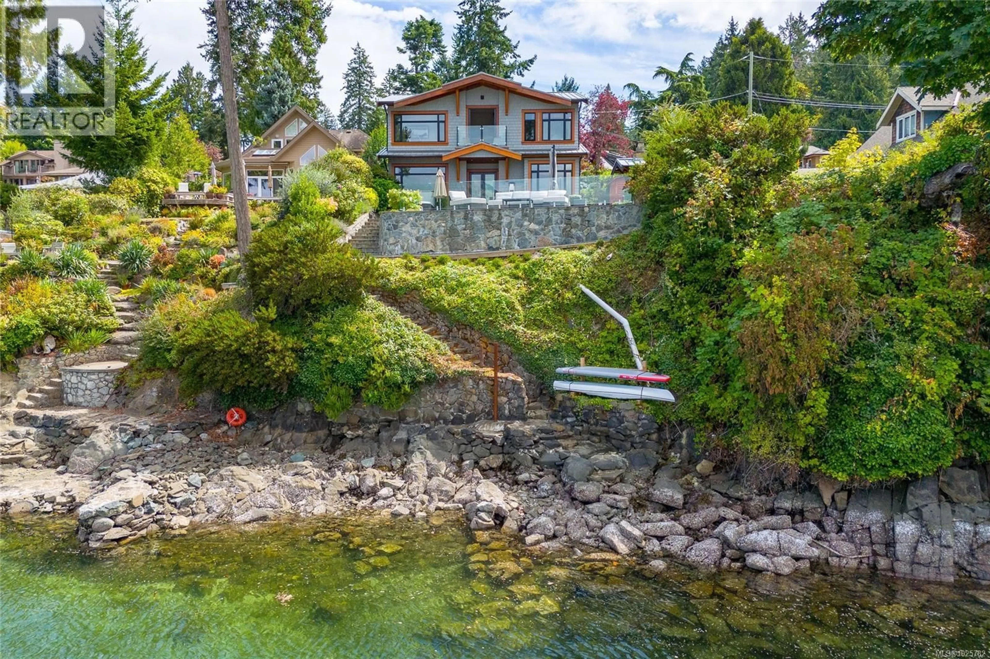 A pic from outside/outdoor area/front of a property/back of a property/a pic from drone, water/lake/river/ocean view for 580 MELDRAM DRIVE, North Saanich British Columbia V8L5V8
