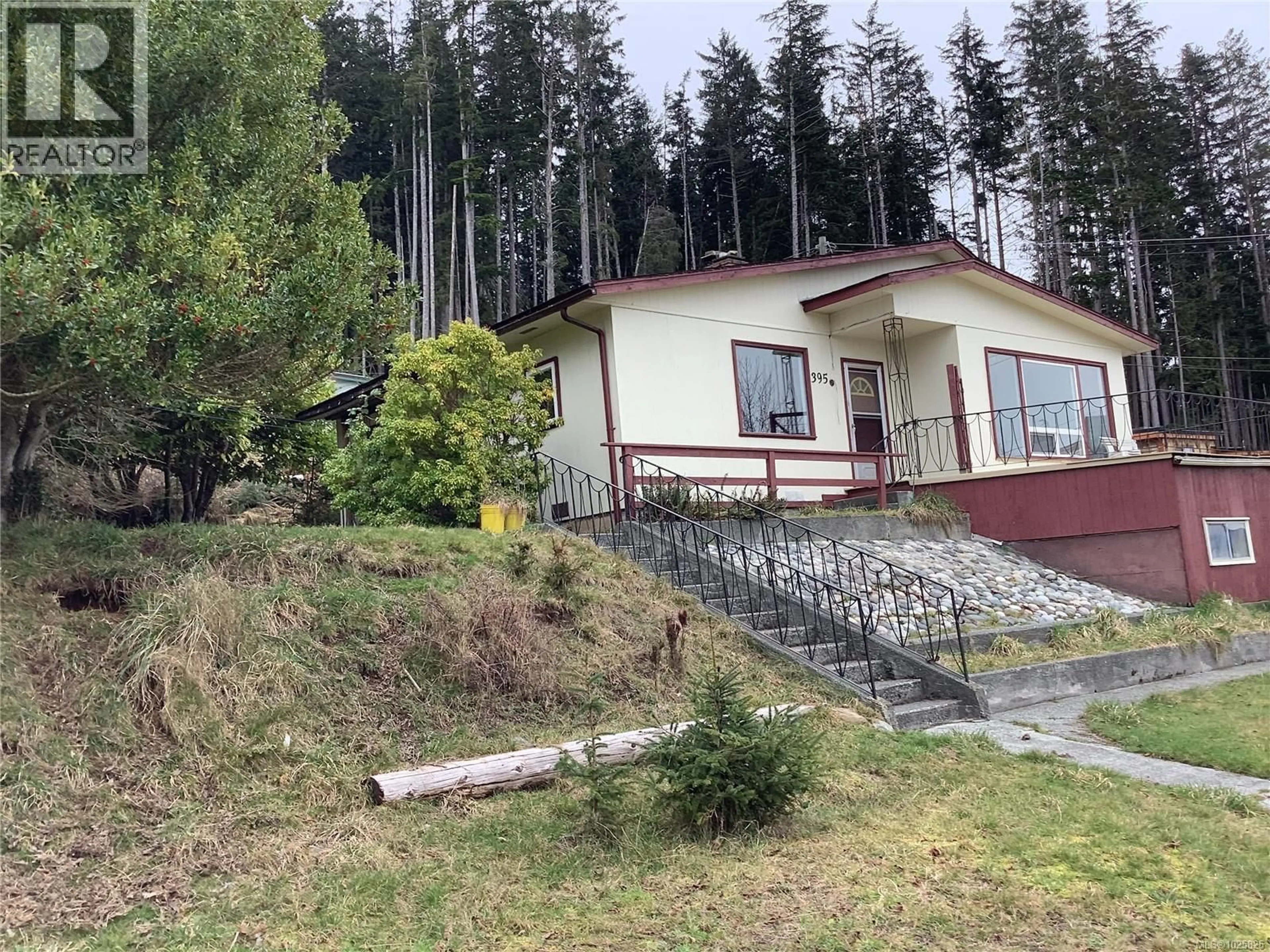 A pic from outside/outdoor area/front of a property/back of a property/a pic from drone, mountain view for 395 2ND STREET, Sointula British Columbia V0N3E0