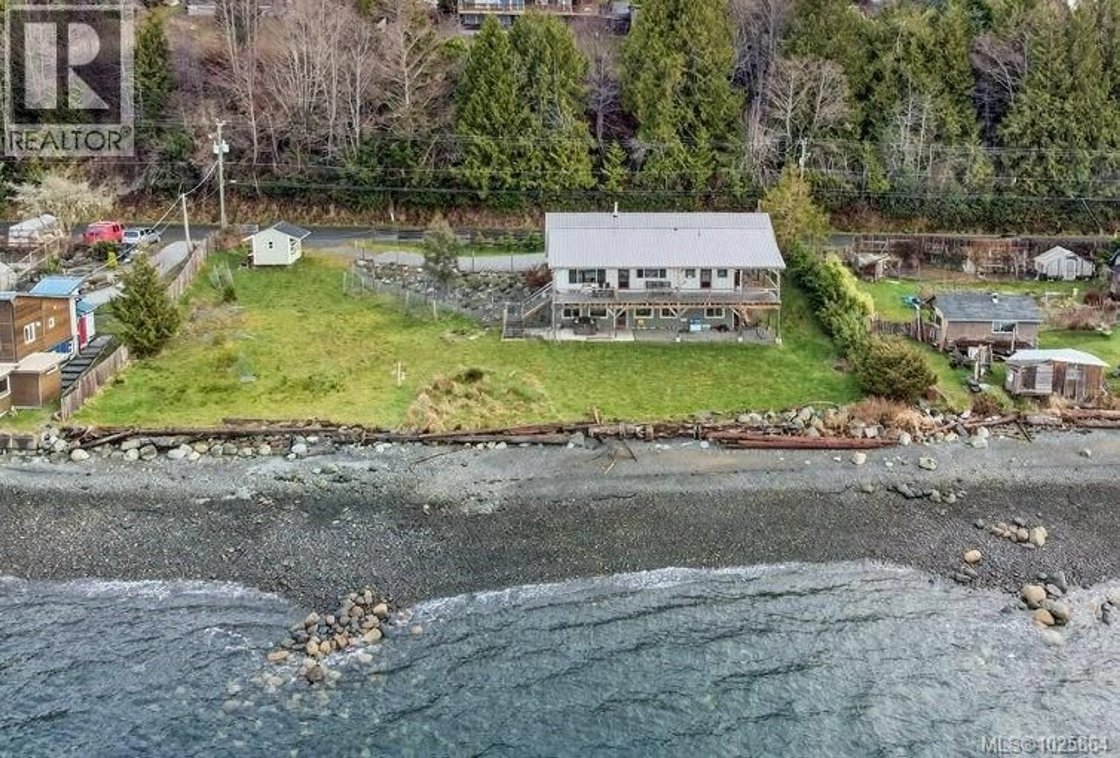 A pic from outside/outdoor area/front of a property/back of a property/a pic from drone, water/lake/river/ocean view for 420 1ST STREET, Sointula British Columbia V0N3E0