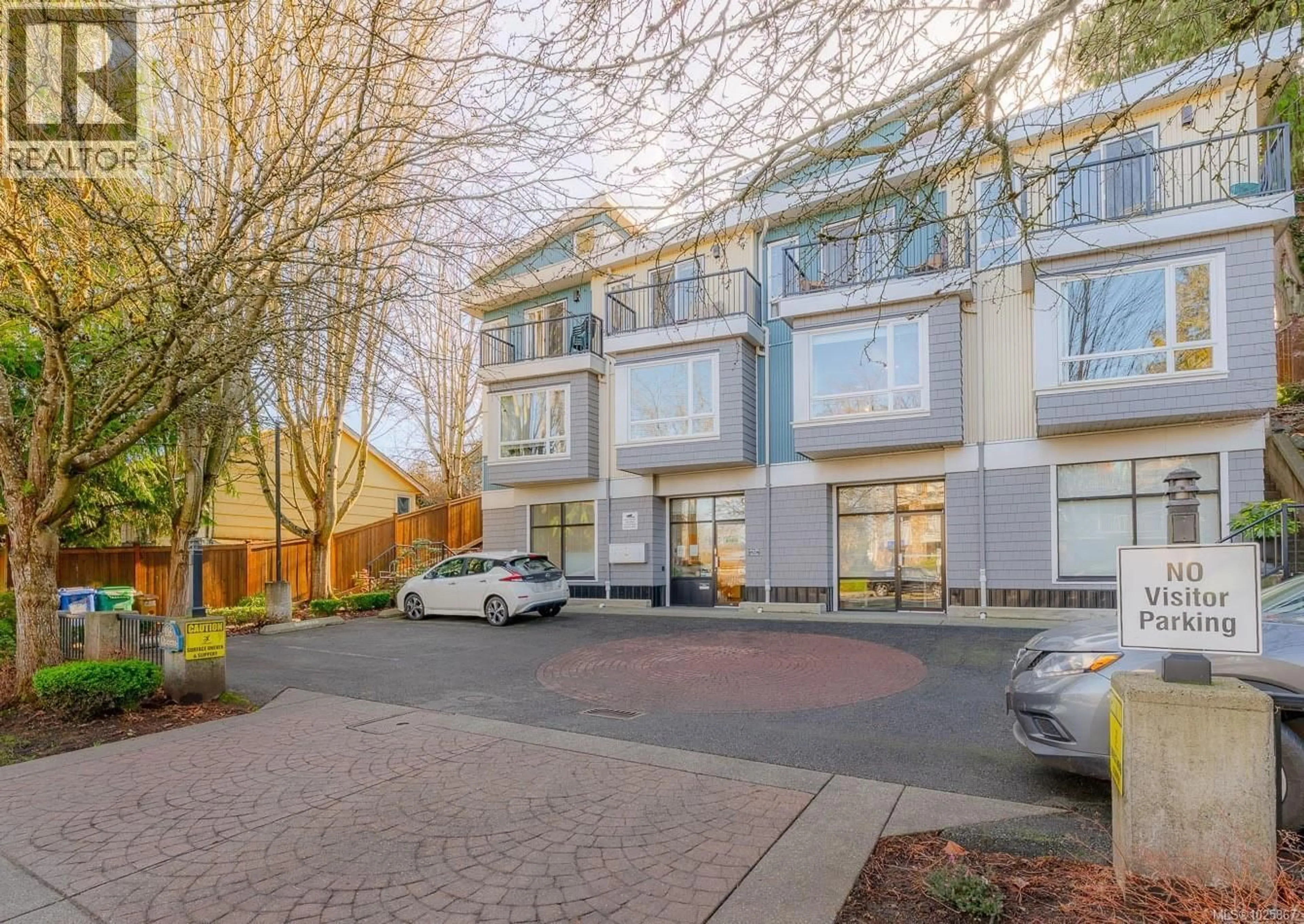 A pic from outside/outdoor area/front of a property/back of a property/a pic from drone, street for 202 - 116 QUEENS ROAD, Duncan British Columbia V9L2W6