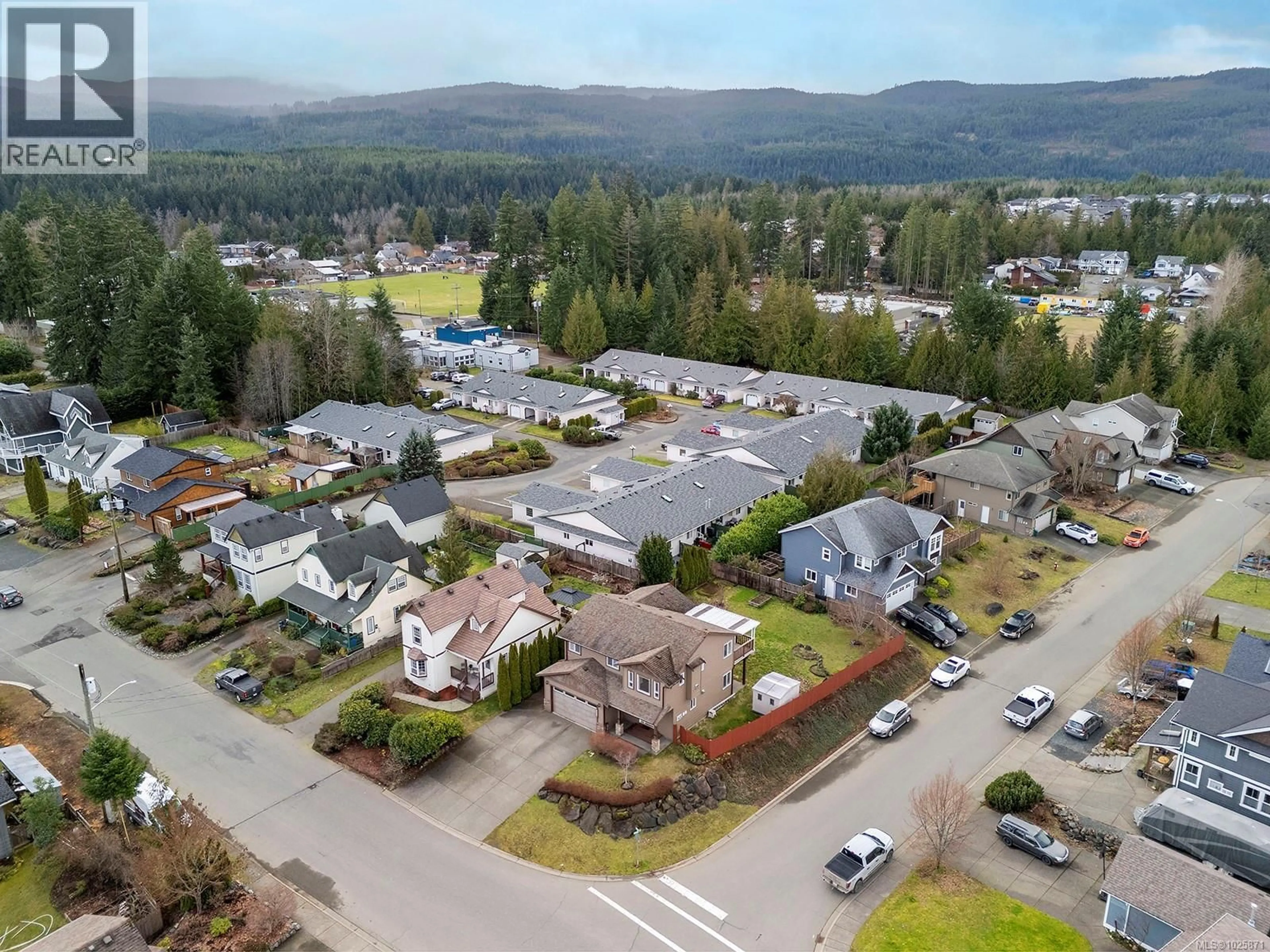 A pic from outside/outdoor area/front of a property/back of a property/a pic from drone, mountain view for 3367 FIRST STREET, Cumberland British Columbia V0R1S0