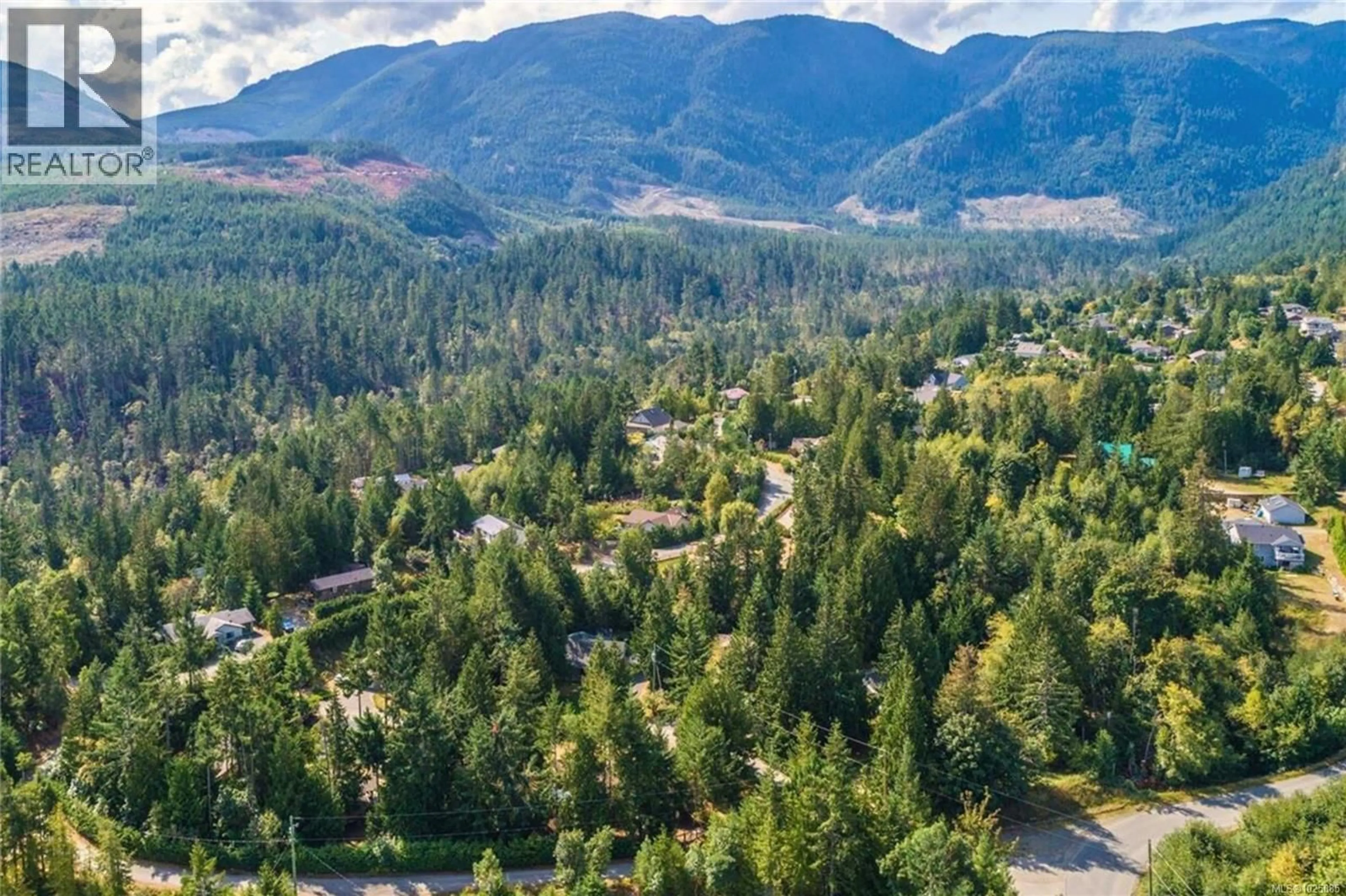 A pic from outside/outdoor area/front of a property/back of a property/a pic from drone, forest/trees view for 1762 MARTINI WAY, Qualicum Beach British Columbia V9K2S3