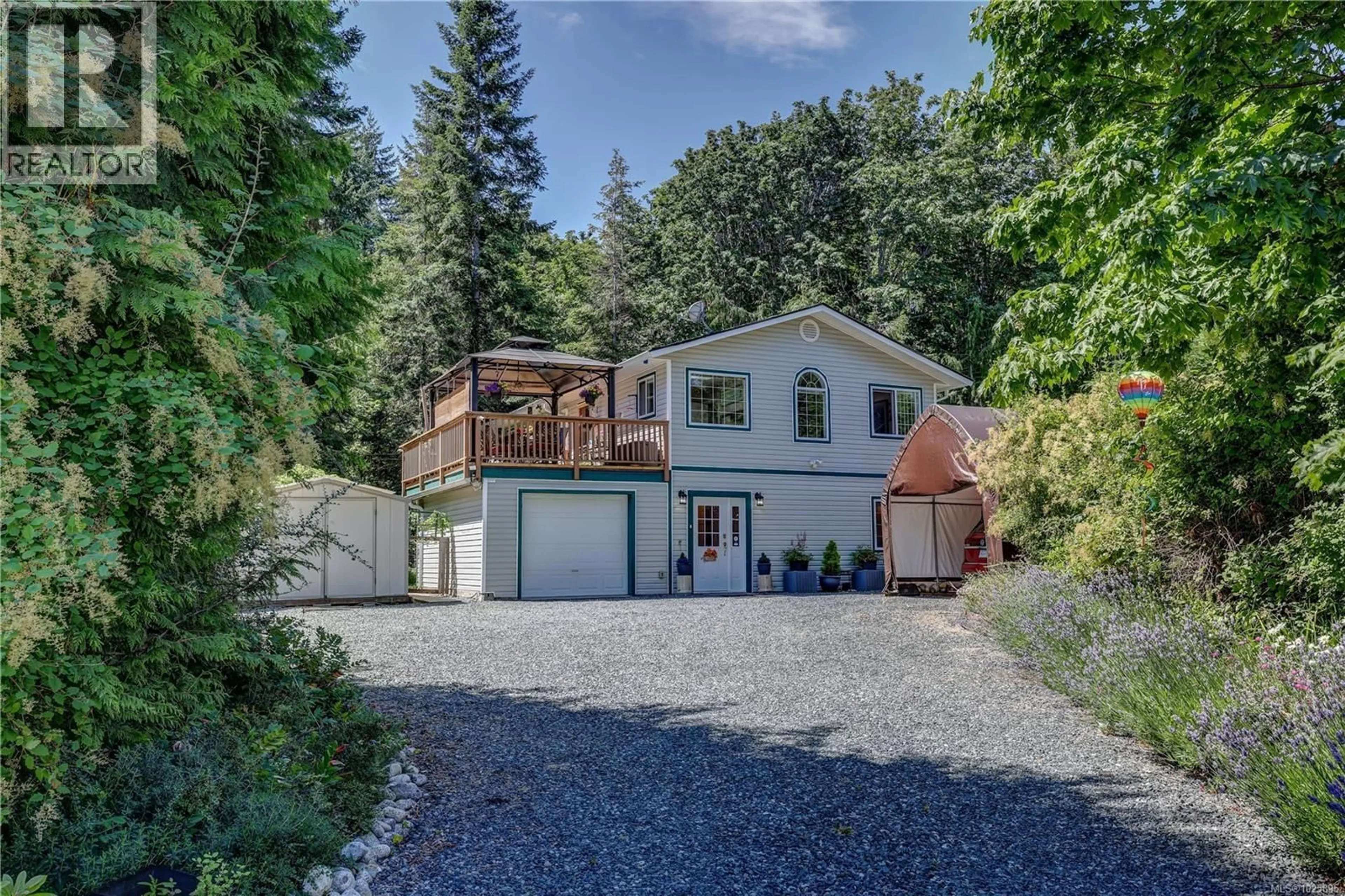 A pic from outside/outdoor area/front of a property/back of a property/a pic from drone, street for 4840 BLUE HERON DRIVE, Bowser British Columbia V0R1G0