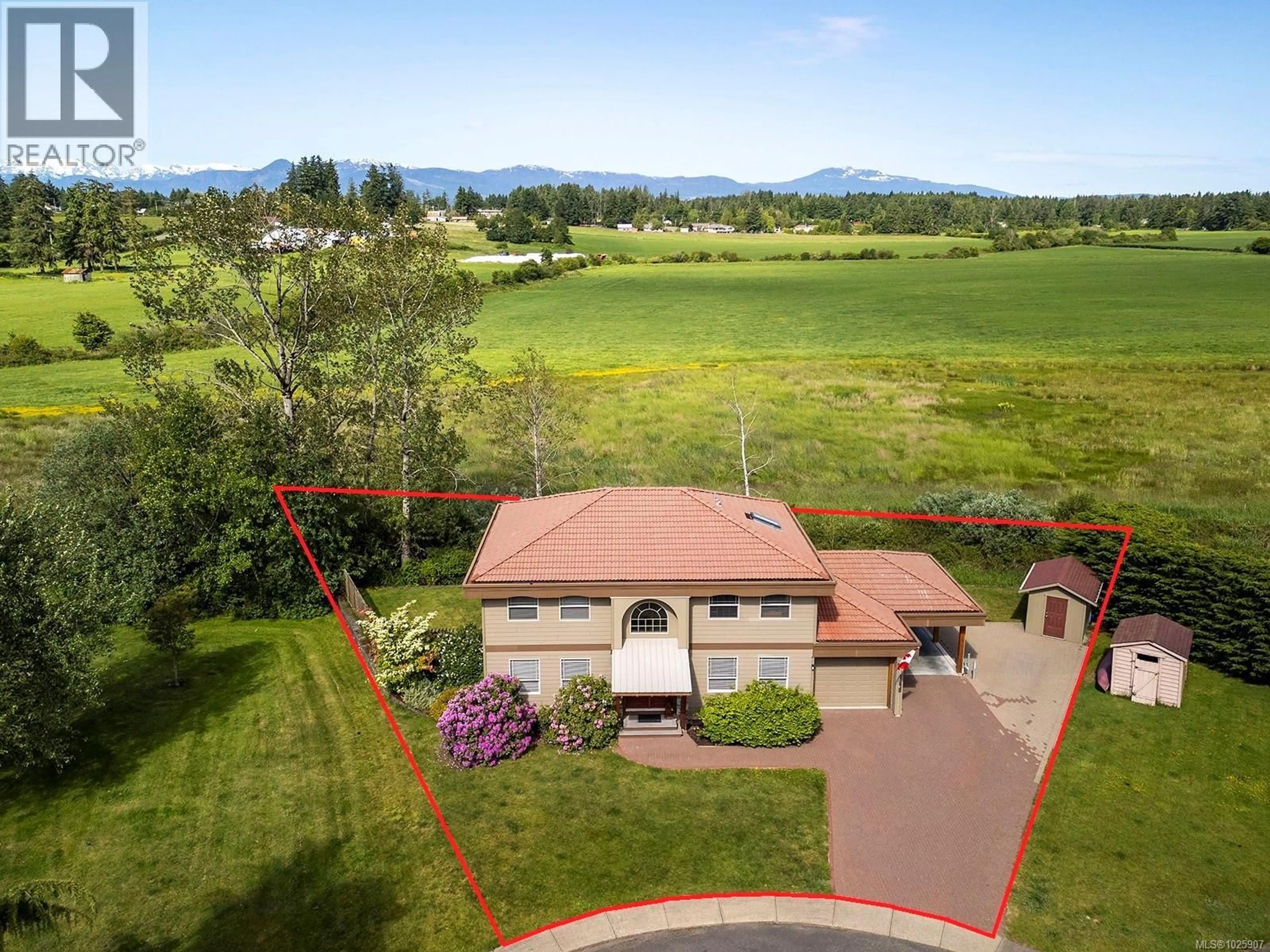 A pic from outside/outdoor area/front of a property/back of a property/a pic from drone, mountain view for 1675 CHESTER PLACE, Comox British Columbia V9M1A9