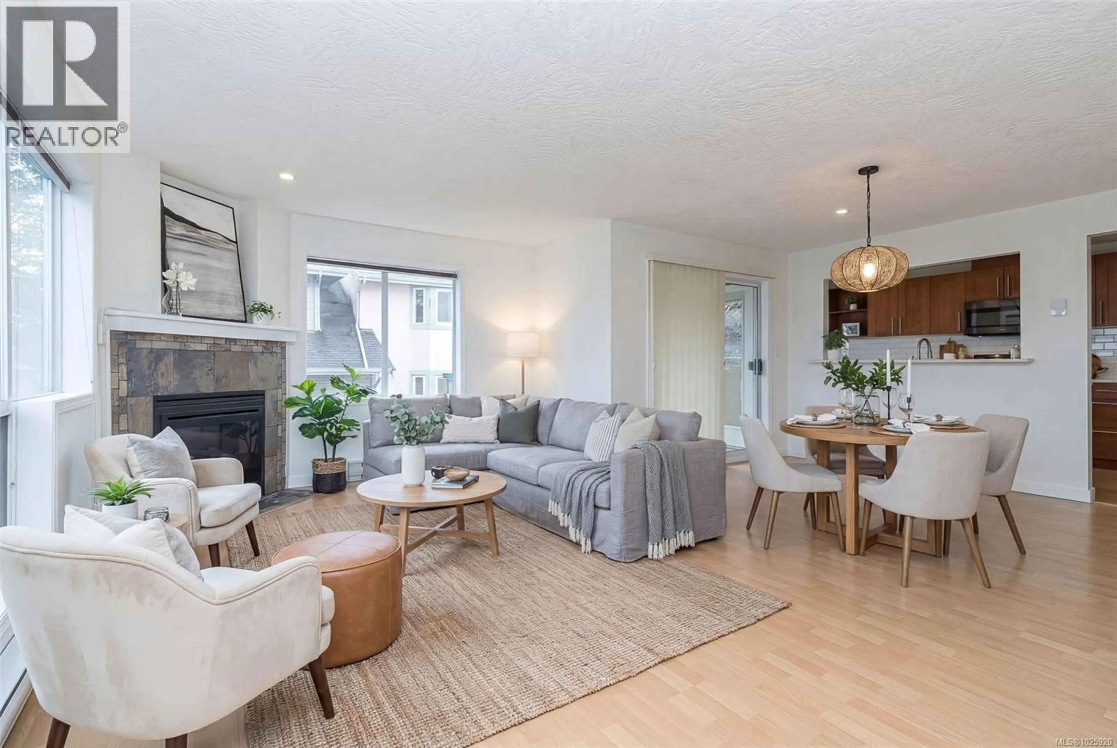 Living room with furniture, wood/laminate floor for 201 - 1007 CALEDONIA AVENUE, Victoria British Columbia V8T1E7