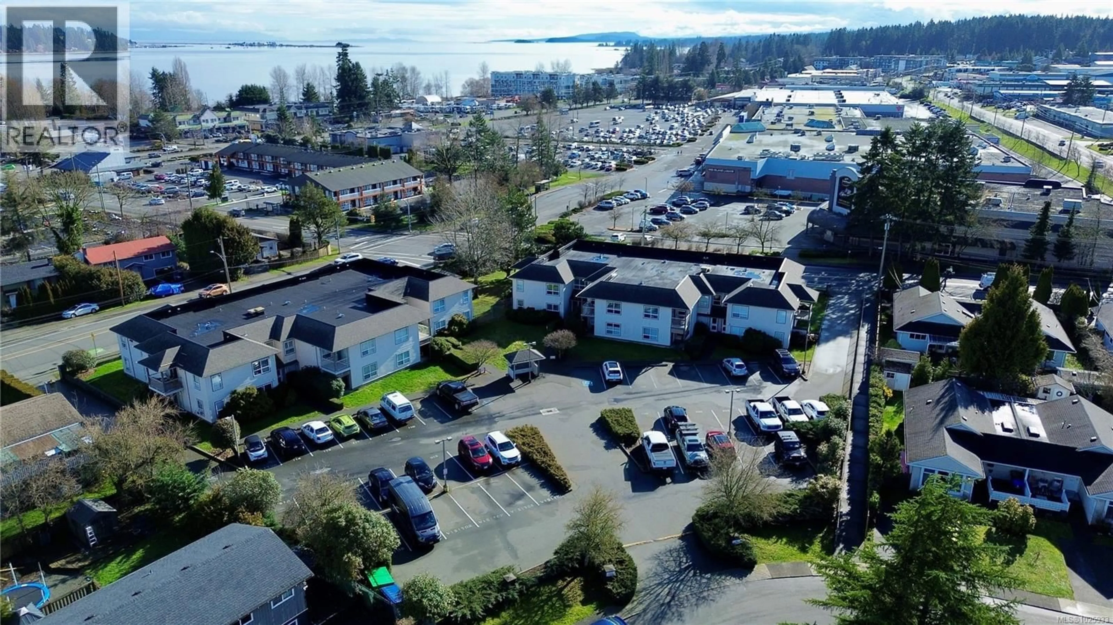 A pic from outside/outdoor area/front of a property/back of a property/a pic from drone, water/lake/river/ocean view for 202 - 2525 FITZGERALD AVENUE, Courtenay British Columbia V9N6J4