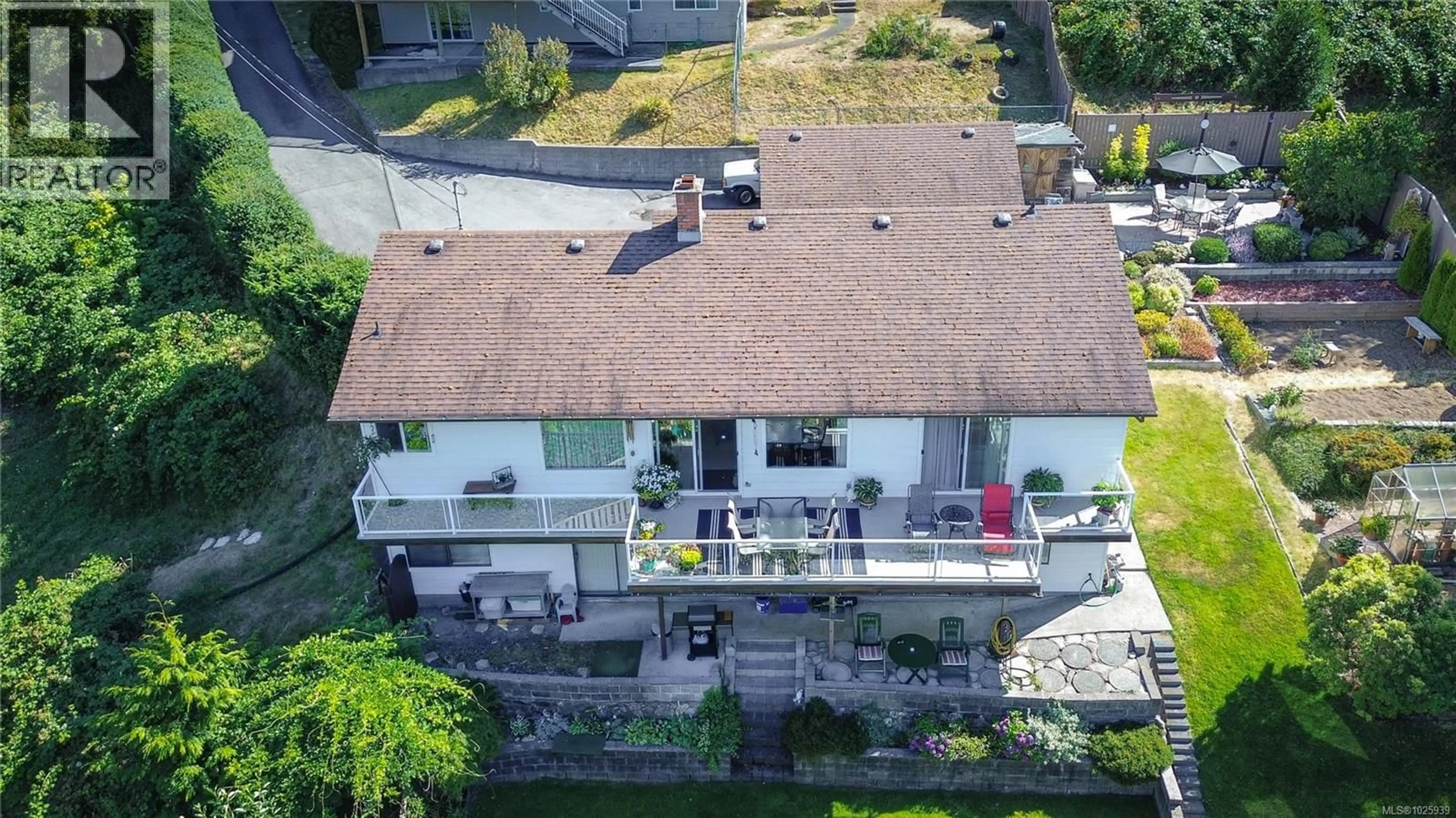 A pic from outside/outdoor area/front of a property/back of a property/a pic from drone, street for 161 BONAVISTA PLACE, Nanaimo British Columbia V9T5N4