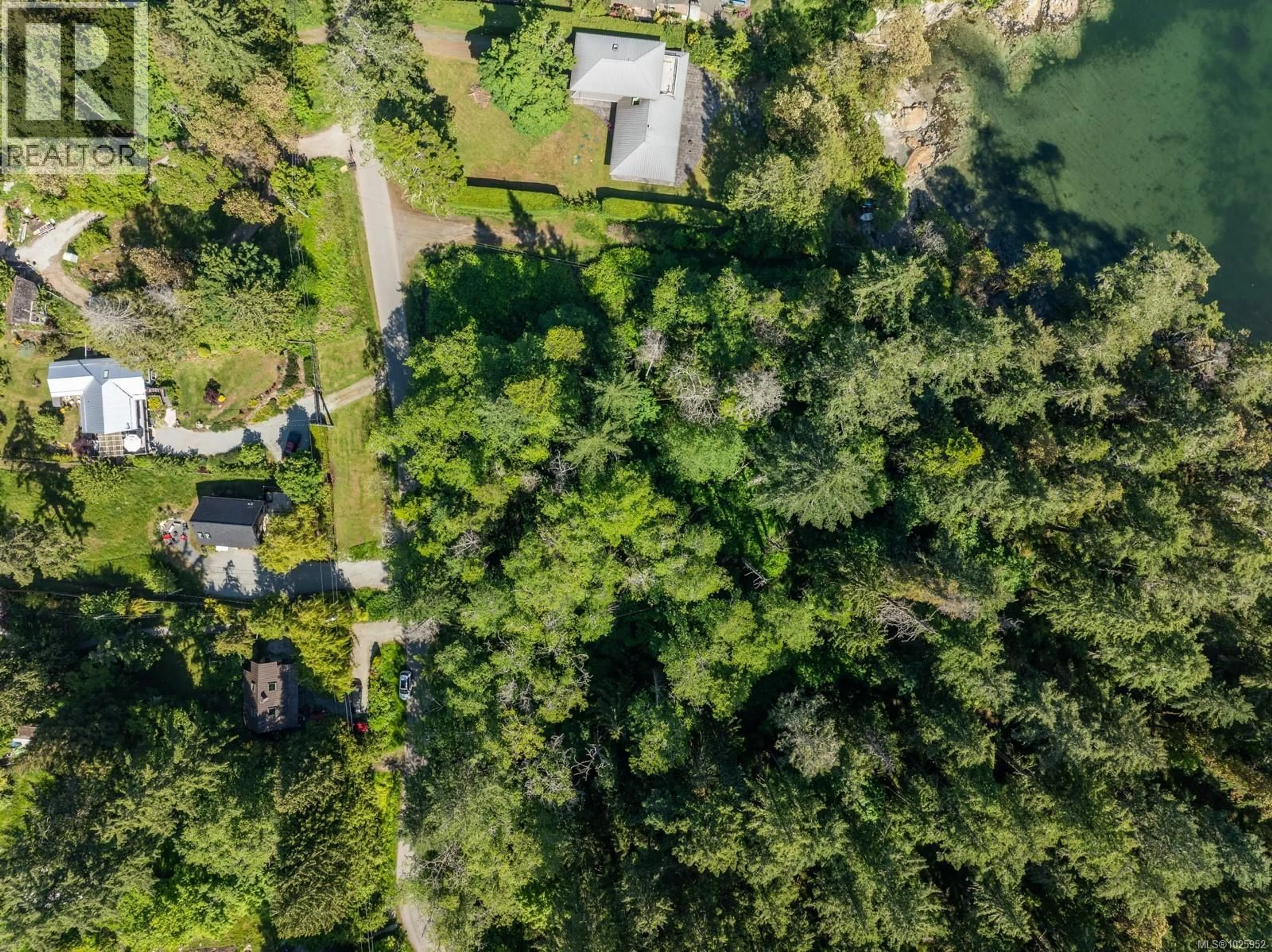 A pic from outside/outdoor area/front of a property/back of a property/a pic from drone, water/lake/river/ocean view for 146 MENHINICK DRIVE, Salt Spring British Columbia V8K1W7
