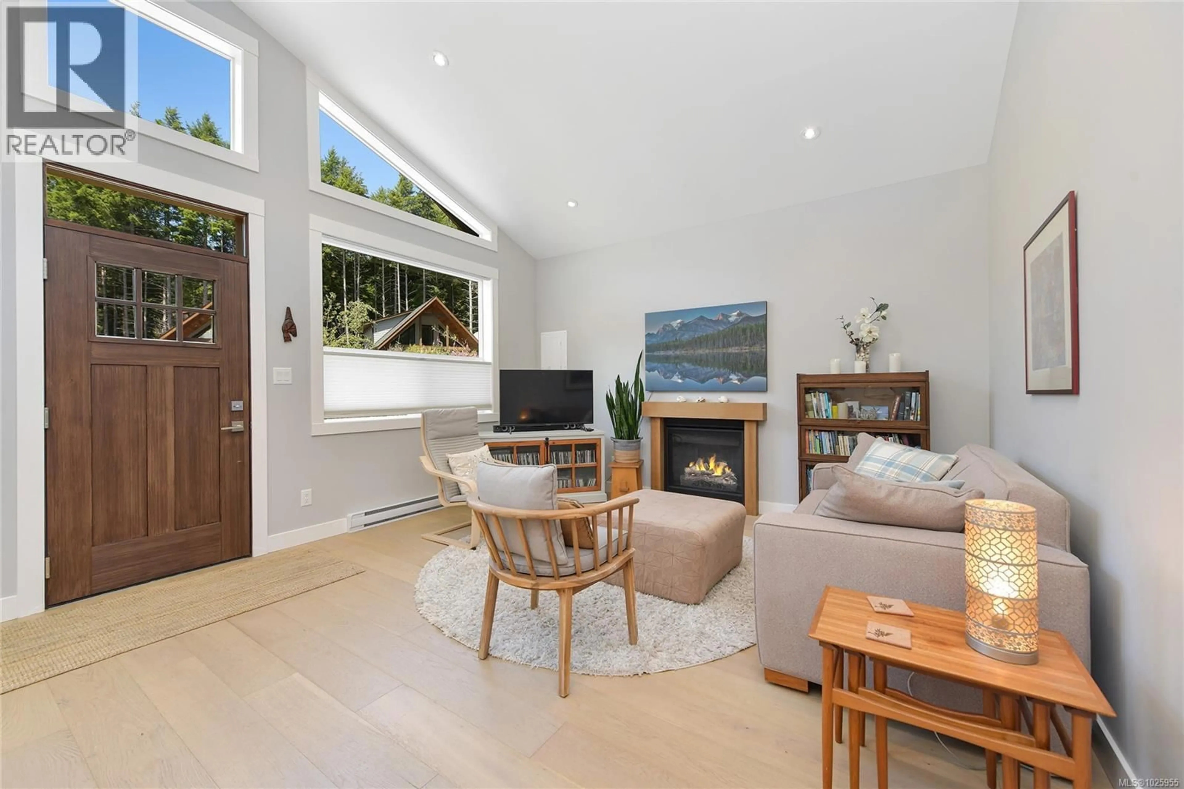 Living room with furniture, wood/laminate floor for 3822 TRAILHEAD DRIVE, Sooke British Columbia V9Z1L1