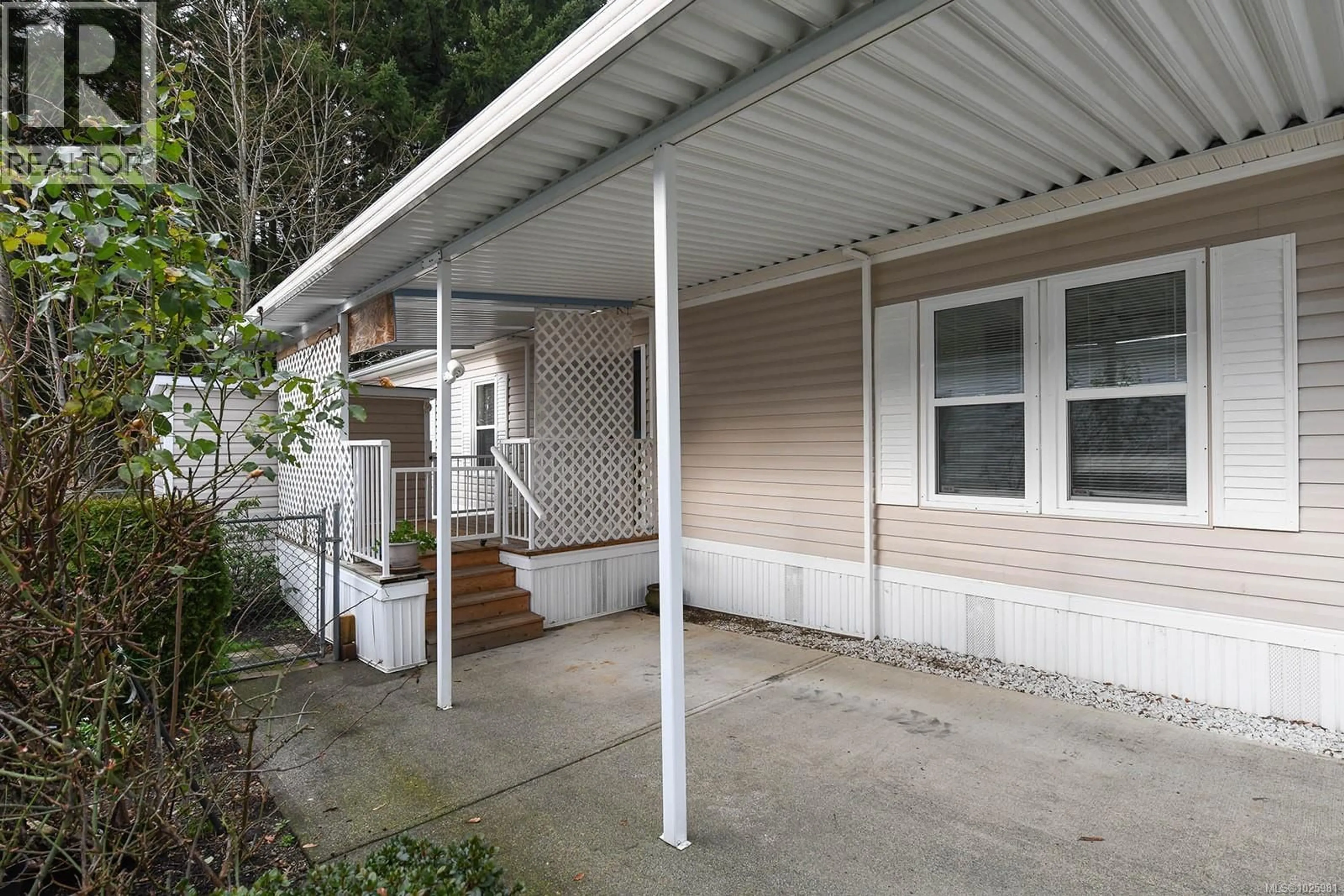 Home with vinyl exterior material, street for 2 - 4714 MUIR ROAD, Courtenay British Columbia V9N8Z6