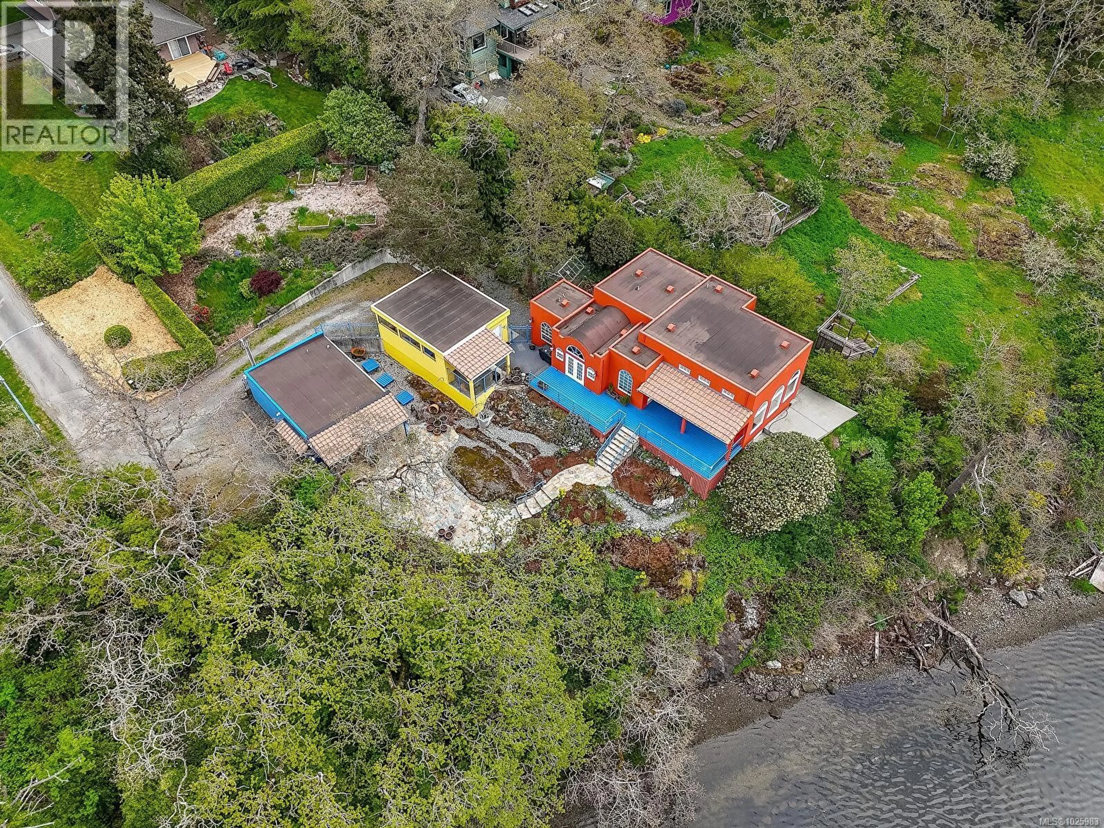 A pic from outside/outdoor area/front of a property/back of a property/a pic from drone, street for 3711 GRANGE ROAD, Saanich British Columbia V8Z4S9