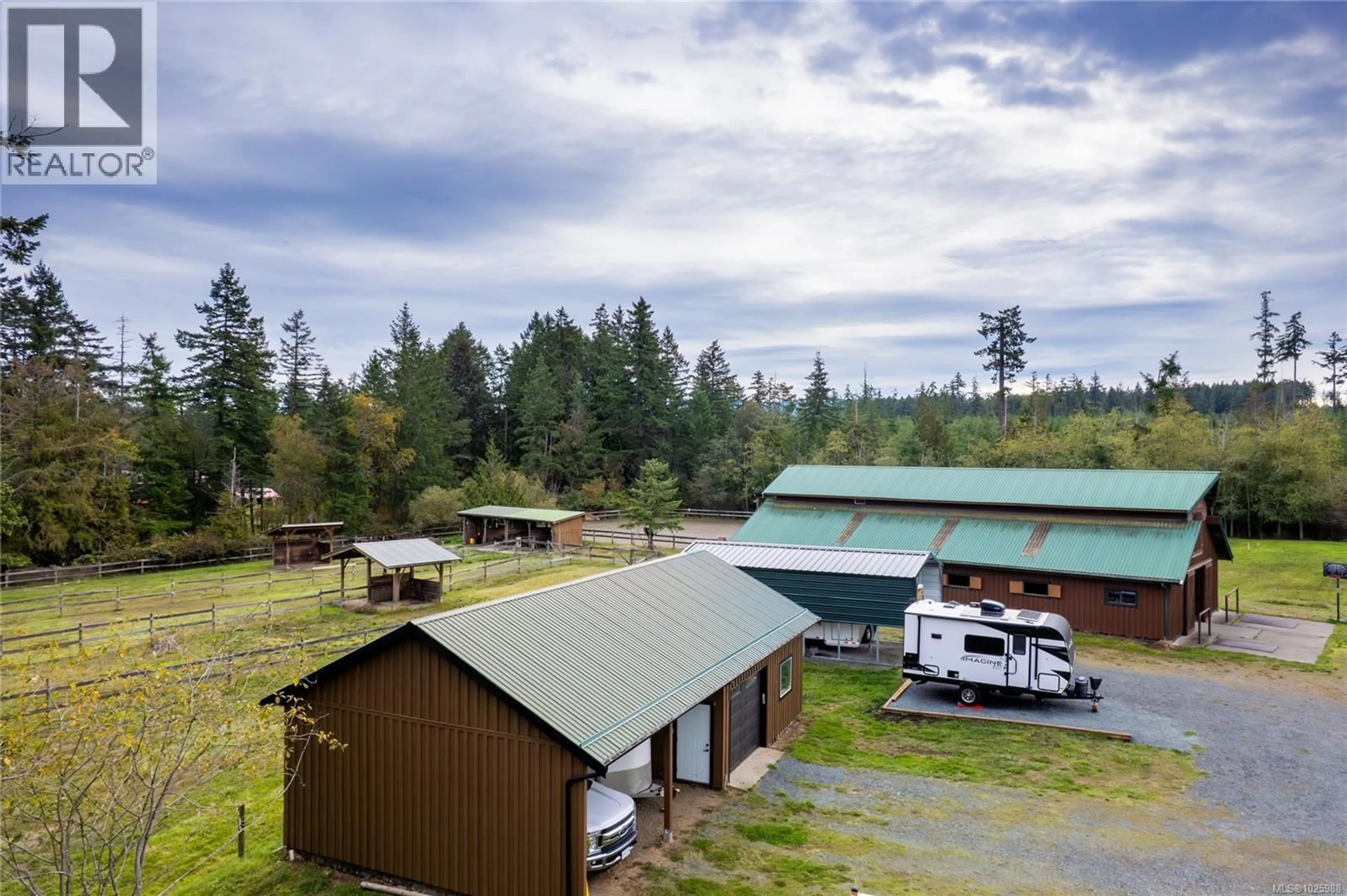 A pic from outside/outdoor area/front of a property/back of a property/a pic from drone, mountain view for 2040 SADDLE DRIVE, Nanoose Bay British Columbia V9P9C2