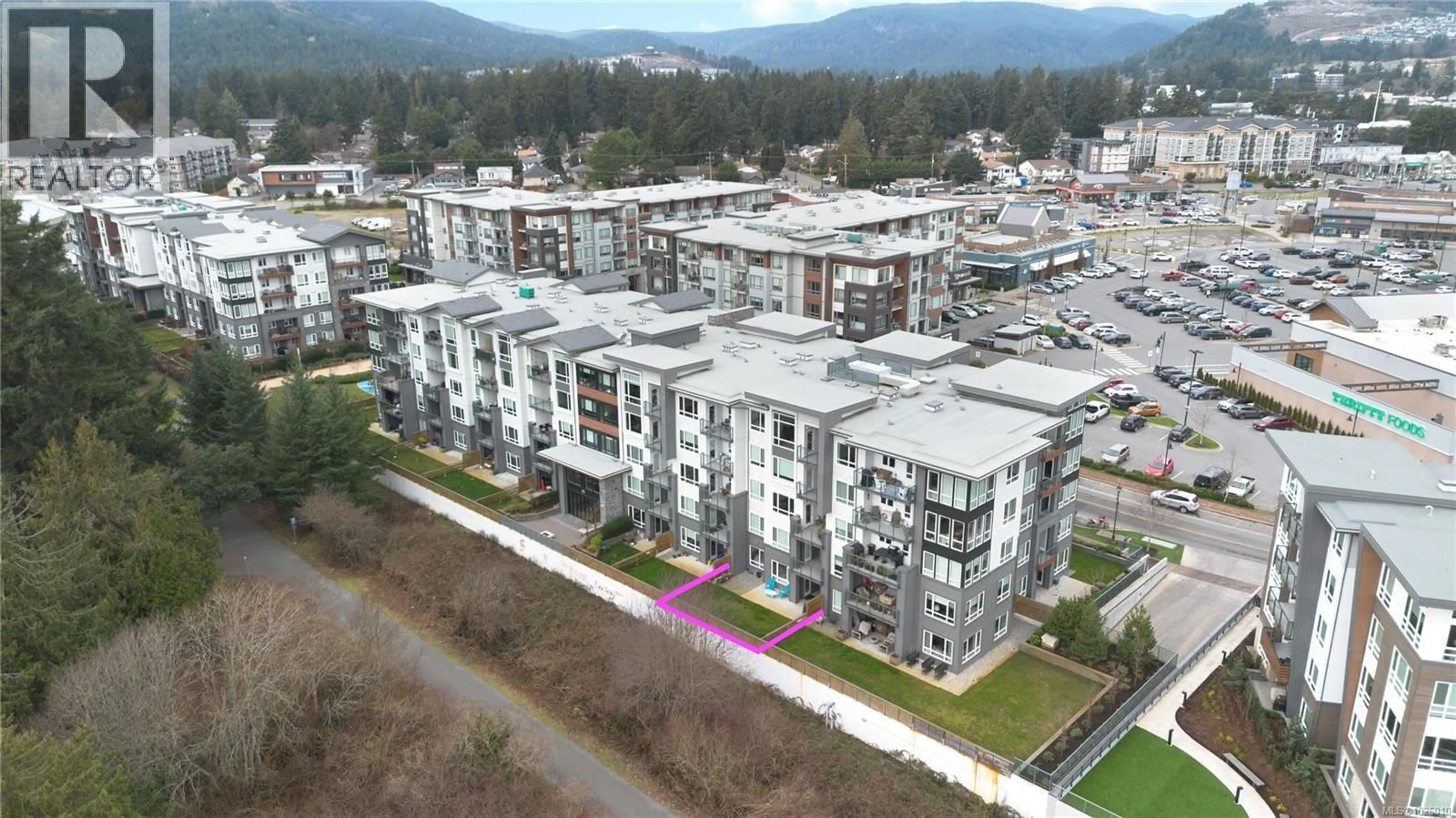 A pic from outside/outdoor area/front of a property/back of a property/a pic from drone, mountain view for 103 - 940 REUNION AVENUE, Langford British Columbia V9B0W6